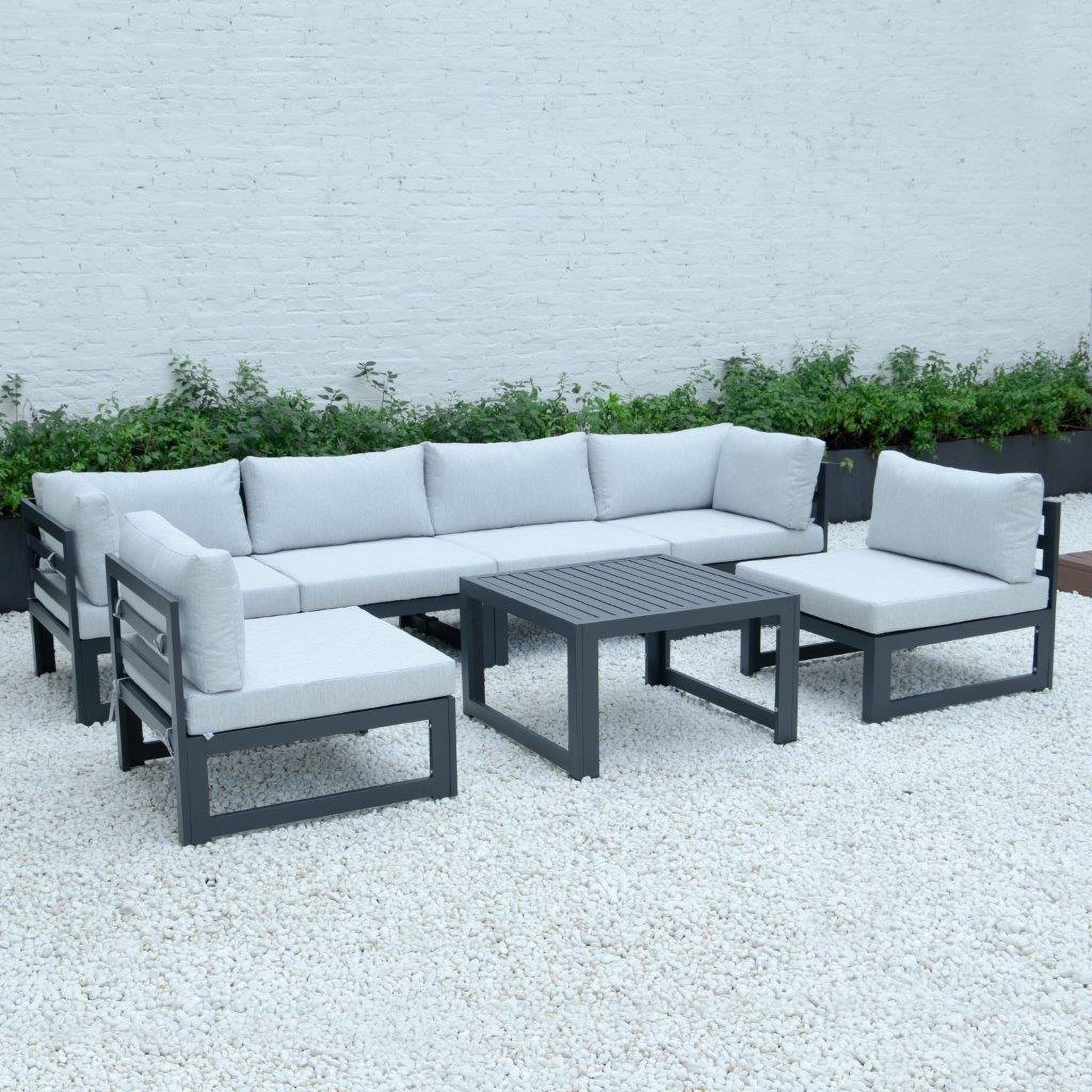 The appearance of Chelsea 7-Piece Patio Sectional And Coffee Table Set With Cushions In Light Grey designed by LeisureMod in the modern / contemporary interior design. This light grey piece of furniture  was selected by 1StopBedrooms from Chelsea Collection to add a touch of cosiness and style into your home. Sku: CSTBL-7LGR. Material: Aluminum.