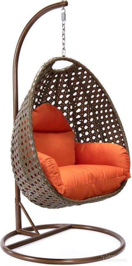 The appearance of Wicker Hanging Egg Swing Chair In Orange/Brown designed by LeisureMod in the modern / contemporary interior design. This orange piece of furniture  was selected by 1StopBedrooms from  to add a touch of cosiness and style into your home. Sku: ESCBG-40OR. Material: Wicker.