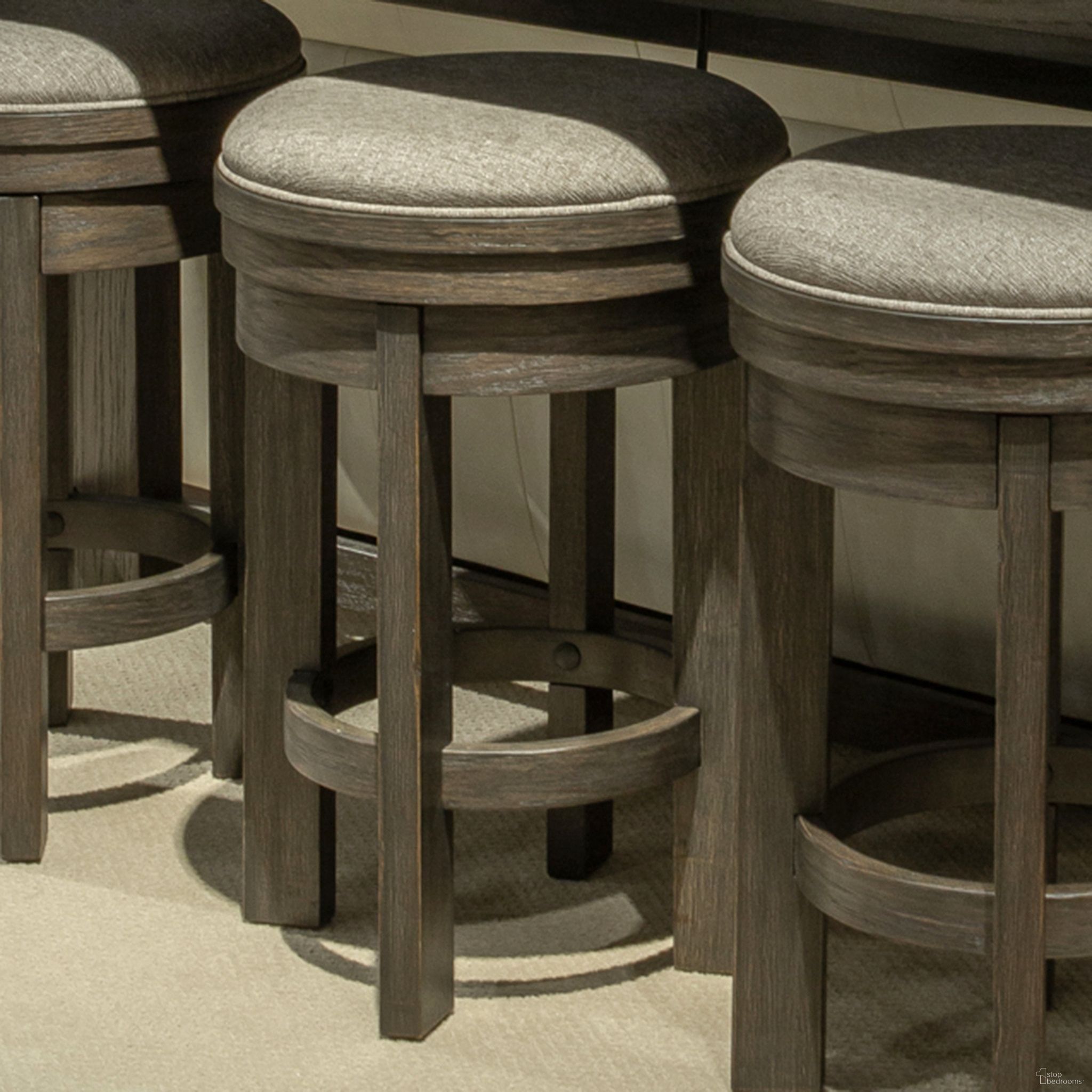 The appearance of Lennox Hill Upholstered Swivel Console Stool In Bark designed by Liberty in the transitional interior design. This bark piece of furniture was selected by 1StopBedrooms from Lennox Hill Collection to add a touch of cosiness and style into your home. Sku: 201-OT9003. Material: Solid Rubberwood.