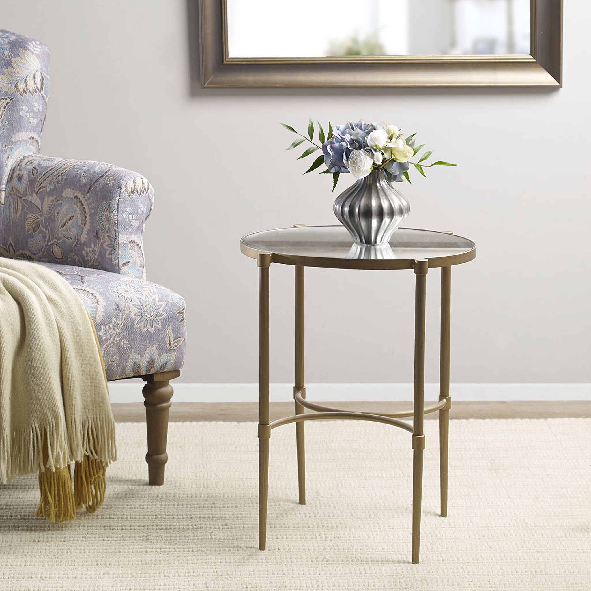 The appearance of Lia Accent Table In Antique Bronze designed by Martha Stewart in the transitional interior design. This antique bronze piece of furniture  was selected by 1StopBedrooms from Lia Collection to add a touch of cosiness and style into your home. Sku: MT120-0025. Material: Metal.