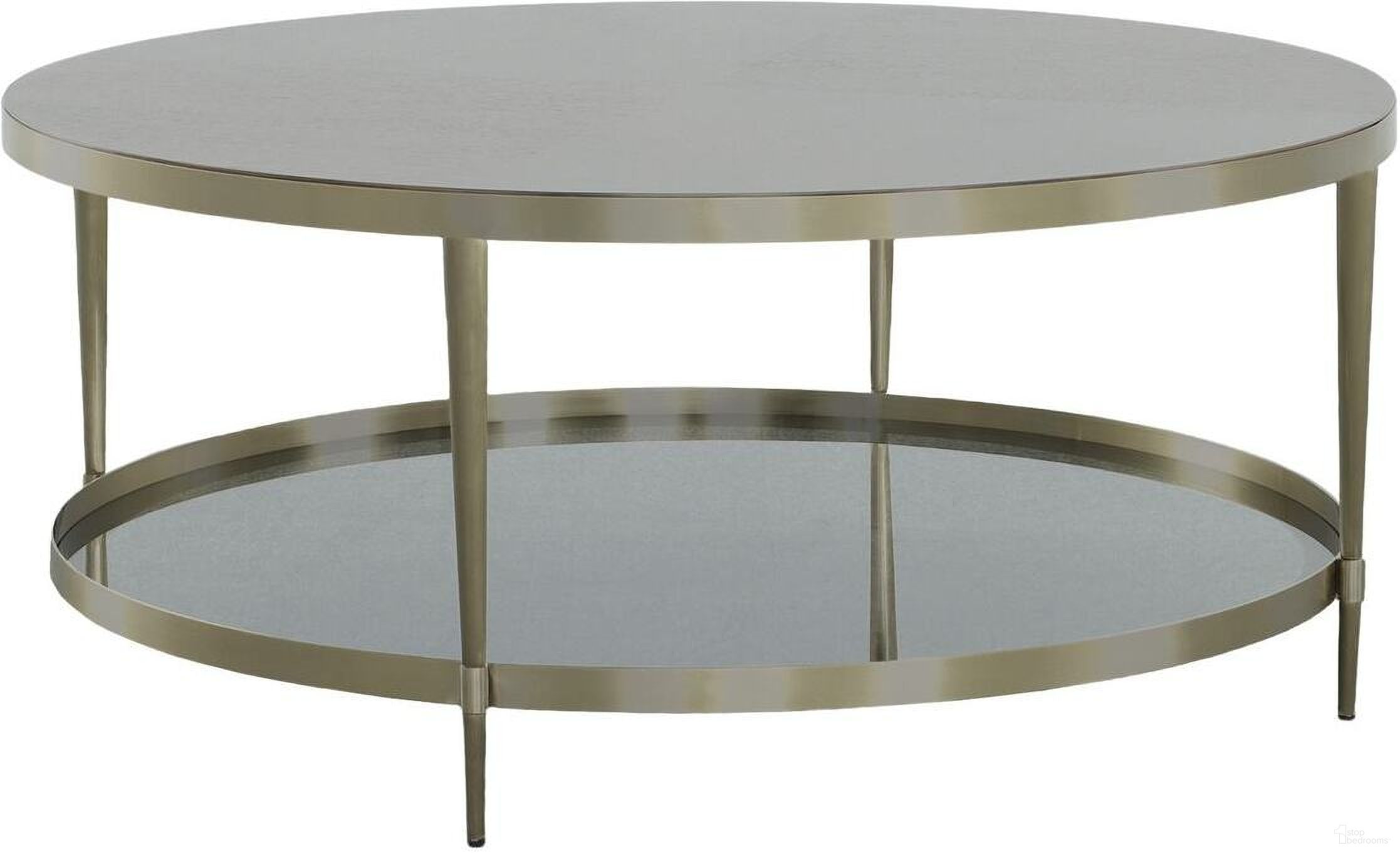 The appearance of Libby Langdon Marlowe Tiered Round Cocktail Table In Smoked Stone designed by Fairfield Chair in the modern / contemporary interior design. This smoked stone piece of furniture  was selected by 1StopBedrooms from Libby Langdon Collection to add a touch of cosiness and style into your home. Sku: 6308-13. Material: Stainless Steel.