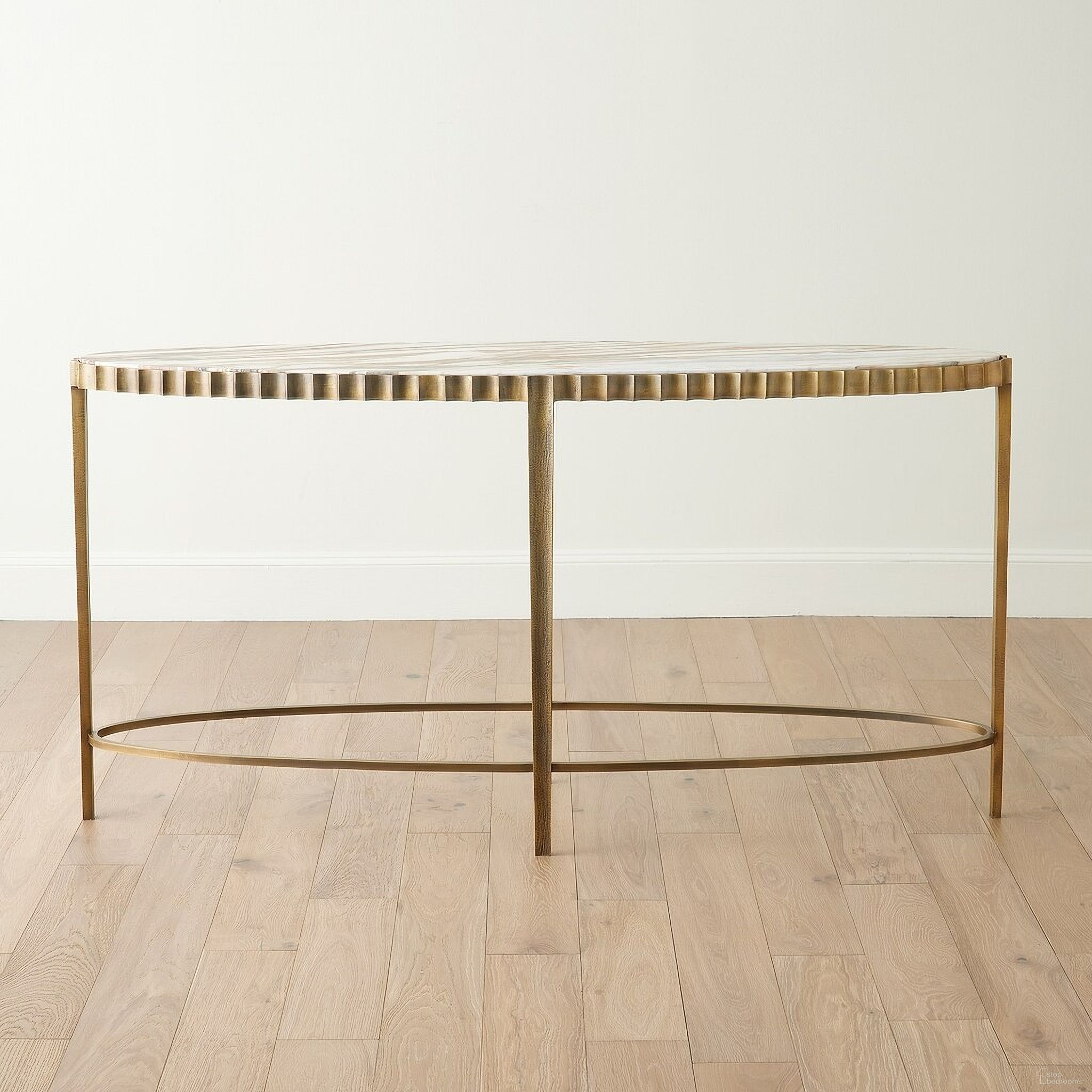 The appearance of Liberty Marble Console In Vintage Brass and Calacatta Gold designed by Global Views in the modern / contemporary interior design. This vintage brass/calacatta gold piece of furniture  was selected by 1StopBedrooms from Liberty Collection to add a touch of cosiness and style into your home. Sku: 994121. Material: Brass.