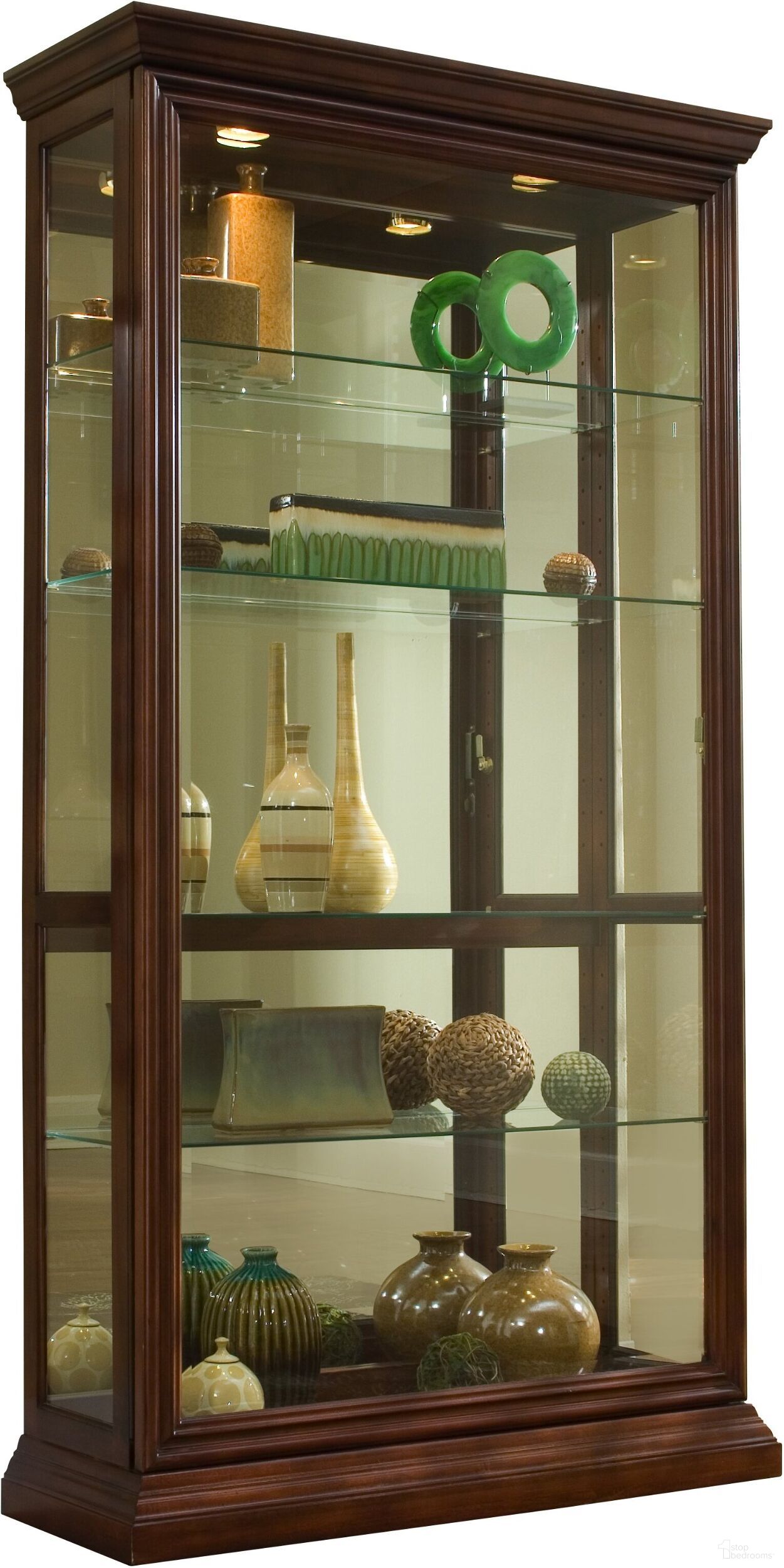 The appearance of Lighted Sliding Door 4 Shelf Curio Cabinet In Cherry Brown designed by Pulaski in the modern / contemporary interior design. This brown piece of furniture was selected by 1StopBedrooms from Curios Collection to add a touch of cosiness and style into your home. Sku: 20542. Material: MDF.