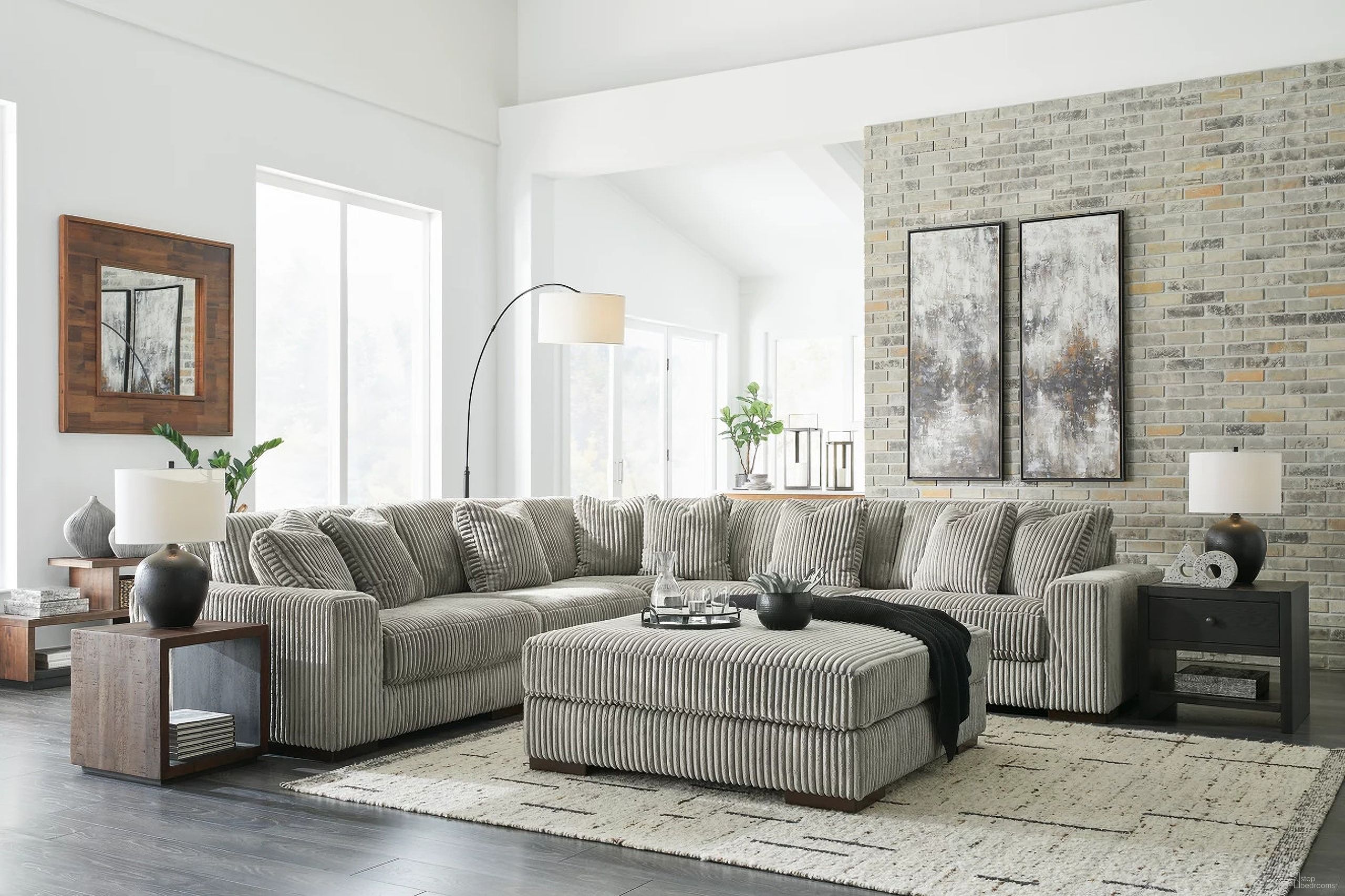 The appearance of Lindyn 5-Piece Sectional and Ottoman In Fog designed by Signature Design by Ashley in the modern / contemporary interior design. This fog piece of furniture was selected by 1StopBedrooms from Lindyn Collection to add a touch of cosiness and style into your home. Sku: 2110564;2110508;2110546;2110546;2110577;2110565. Material: Fabric. Layout: L-Shape.