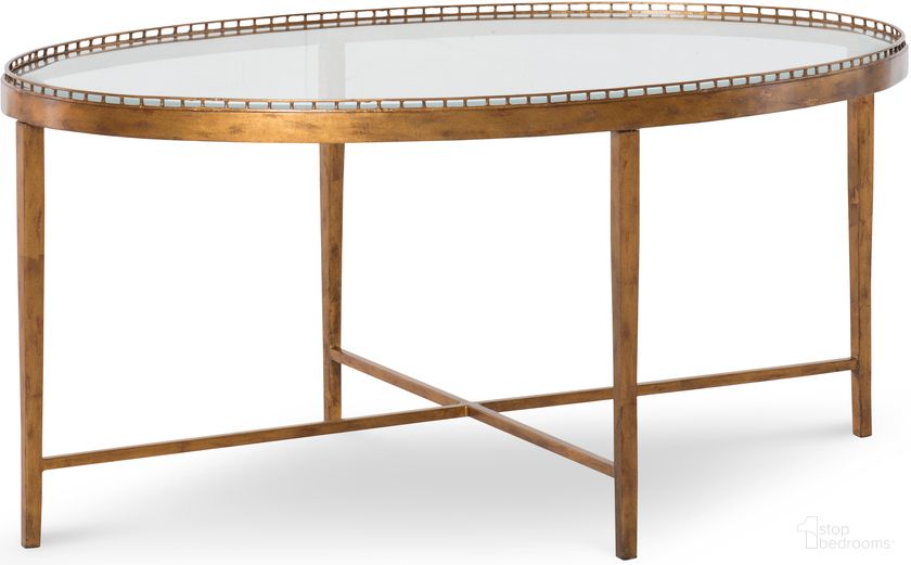 The appearance of Logan Small Oval Cocktail Table 40 x 26 In Gold designed by Century Furniture in the modern / contemporary interior design. This gold piece of furniture  was selected by 1StopBedrooms from Details Occasional Collection to add a touch of cosiness and style into your home. Sku: CSA-102-2. Material: Tempered Glass.