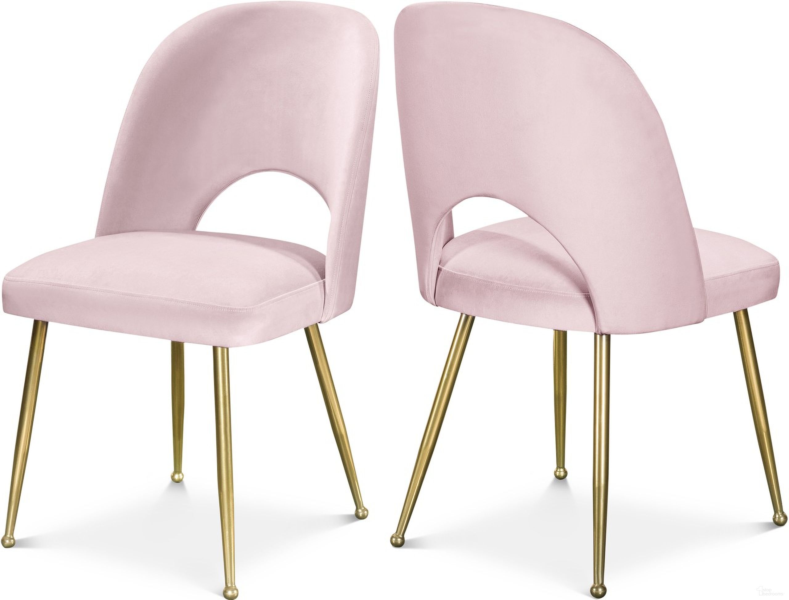 The appearance of Logan Velvet Dining Chair Set of 2 In Pink designed by Meridian in the modern / contemporary interior design. This pink piece of furniture was selected by 1StopBedrooms from Logan Collection to add a touch of cosiness and style into your home. Sku: 990Pink-C. Material: Velvet. Chair Type: Side Chair.