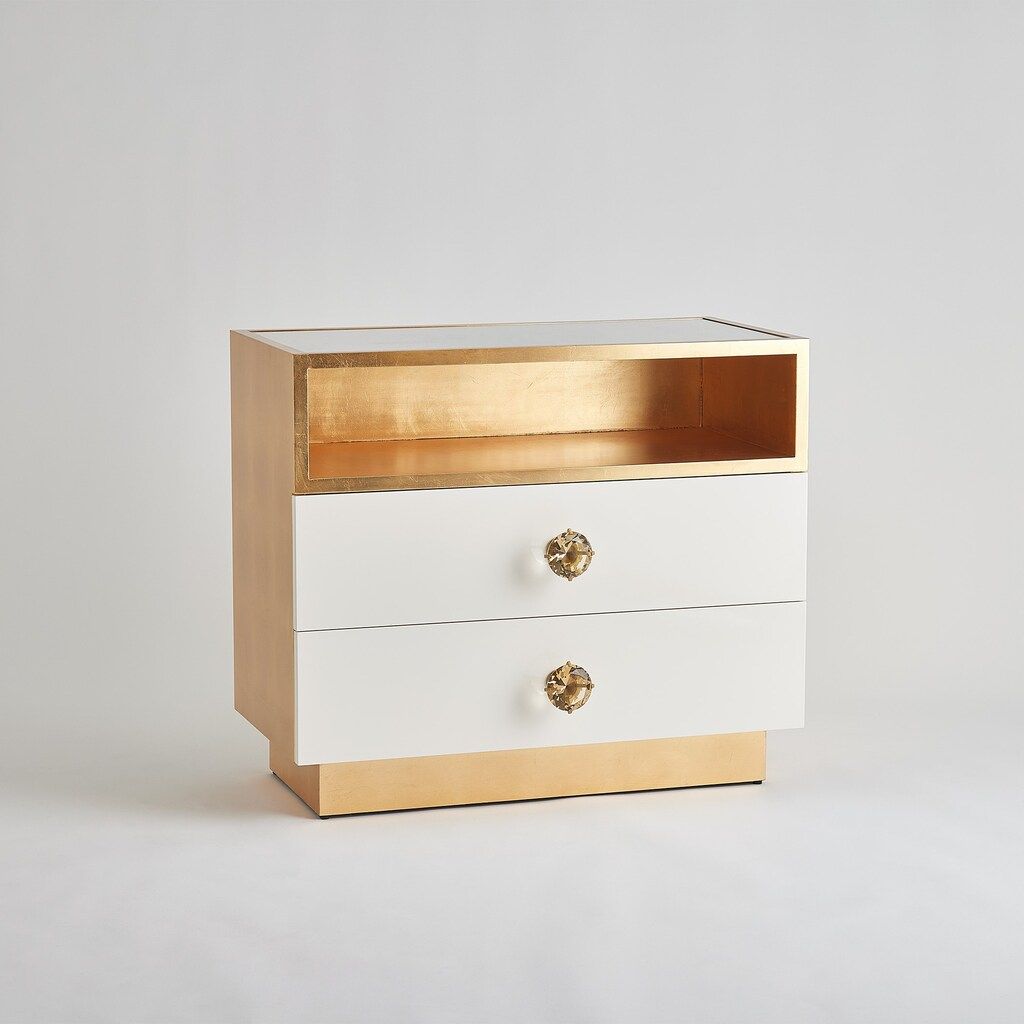 The appearance of London Nightstand In White designed by Global Views in the modern / contemporary interior design. This white piece of furniture was selected by 1StopBedrooms from London Collection to add a touch of cosiness and style into your home. Sku: JB2127. Material: Wood.