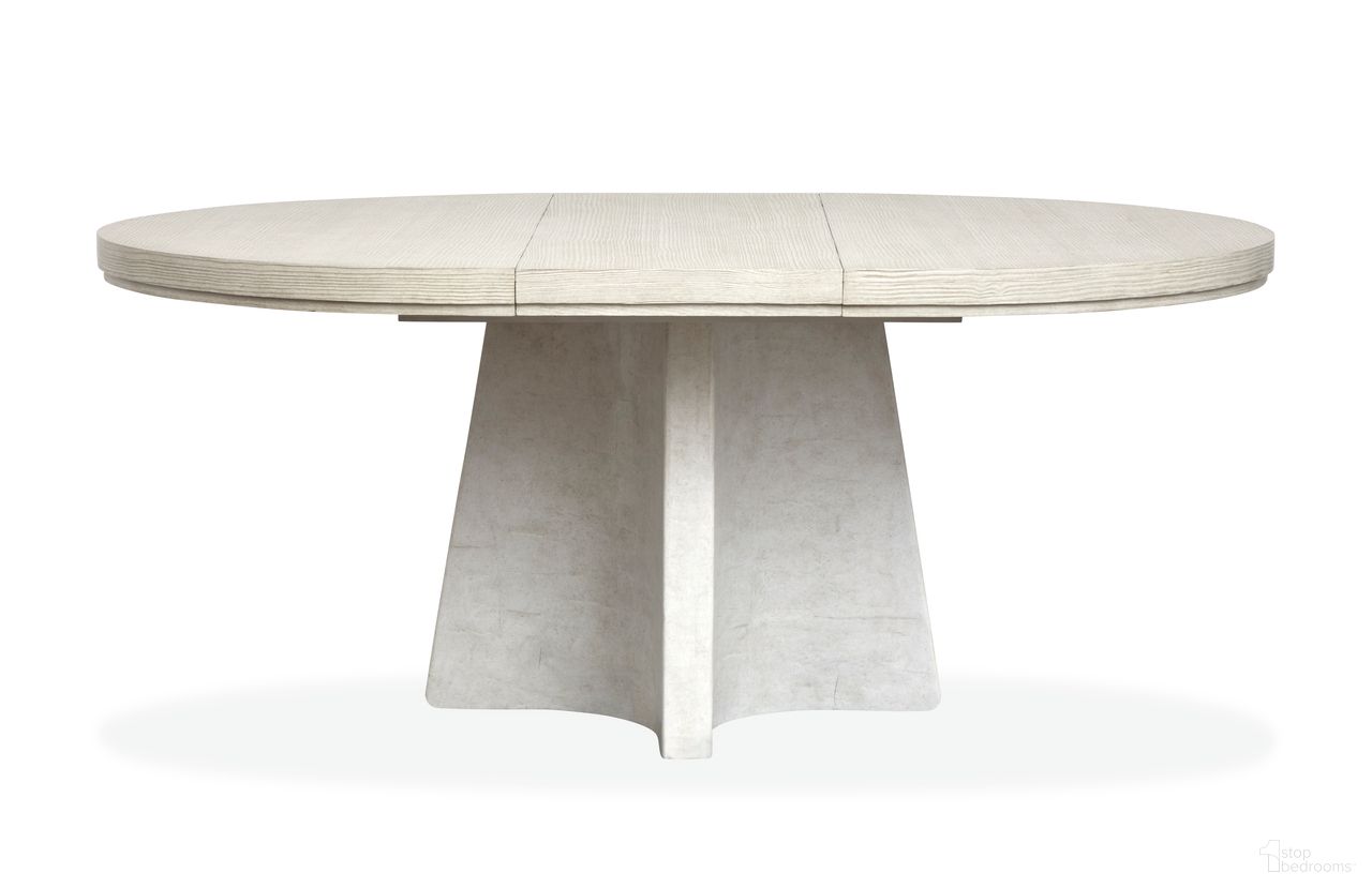 The appearance of Lorelei Extendable 54 Inch Round Dining Table In Misty Cloud designed by Magnussen in the transitional interior design. This misty cloud piece of furniture was selected by 1StopBedrooms from Lorelei Collection to add a touch of cosiness and style into your home. Sku: D5893-24T;D5893-24B. Table Base Style: Pedestal. Table Top Shape: Round. Size: 54". Material: Pine Veneer.