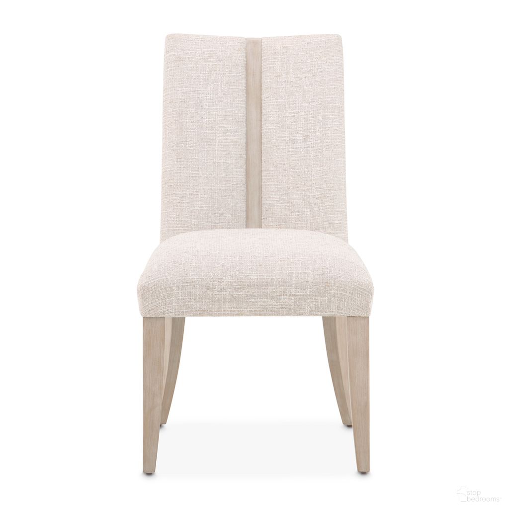 The appearance of Lotus Bay Dining Side Chair Set of 2 In Sand designed by Michael Amini in the transitional interior design. This sand piece of furniture was selected by 1StopBedrooms from Lotus Bay Collection to add a touch of cosiness and style into your home. Sku: 9030003-138. Material: Solid Wood. Chair Type: Side Chair.