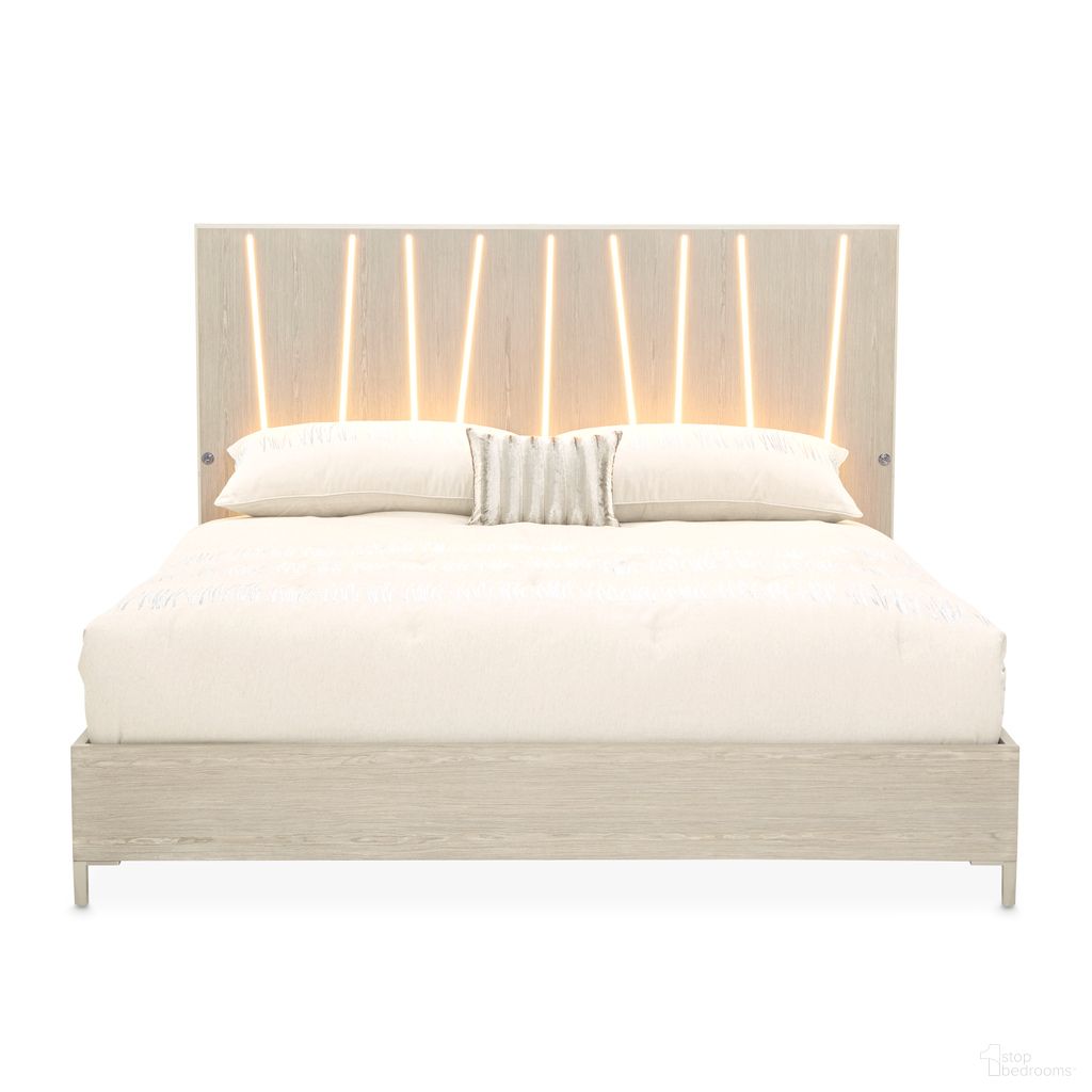 The appearance of Lotus Bay King Panel Bed with LED Lights In Sand designed by Michael Amini in the modern / contemporary interior design. This sand piece of furniture  was selected by 1StopBedrooms from Lotus Bay Collection to add a touch of cosiness and style into your home. Sku: 9030014-138;9030137-138;9000238-00. Bed Type: Panel Bed. Bed Size: King. Material: Solid Wood.