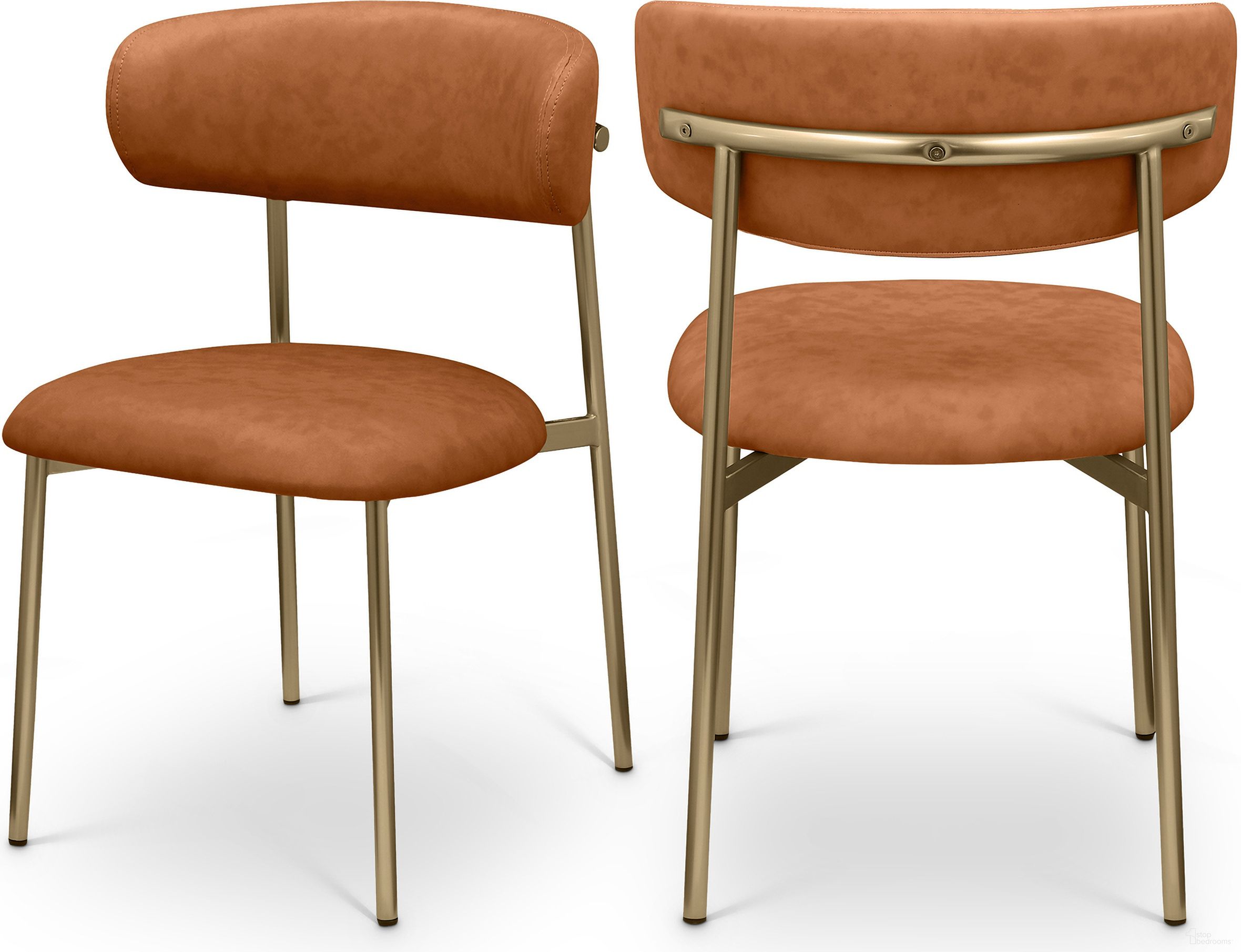 The appearance of Lupita Vegan Leather Dining Chair Set of 2 In Cognac and Brushed Gold designed by Meridian in the modern / contemporary interior design. This cognac piece of furniture  was selected by 1StopBedrooms from Lupita Collection to add a touch of cosiness and style into your home. Sku: 759Cognac-C. Material: Vegan Leather. Chair Type: Side Chair.