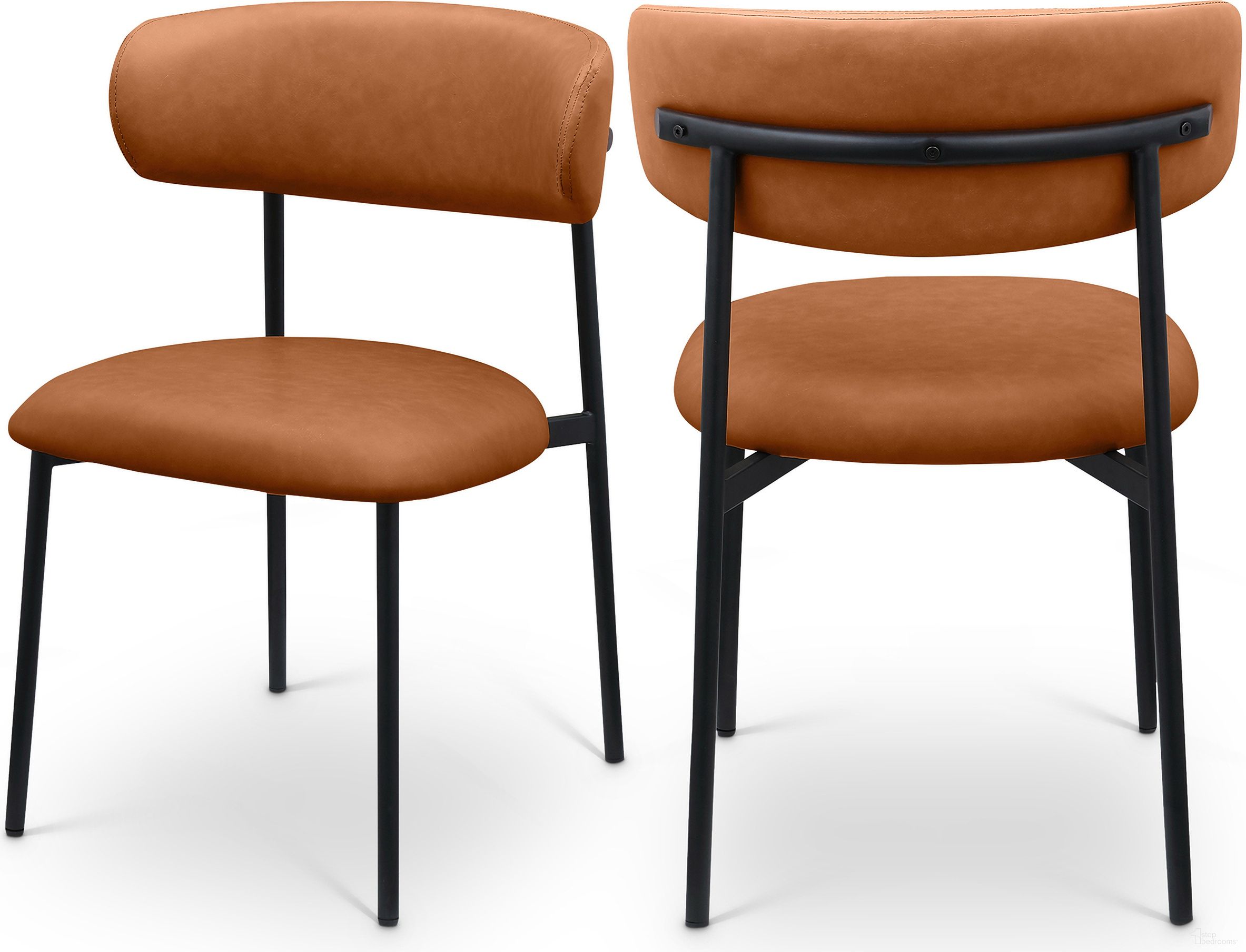 The appearance of Lupita Vegan Leather Dining Chair Set of 2 In Cognac and Matte Black designed by Meridian in the modern / contemporary interior design. This cream and matte black piece of furniture  was selected by 1StopBedrooms from Lupita Collection to add a touch of cosiness and style into your home. Sku: 760Cognac-C. Material: Vegan Leather. Chair Type: Side Chair.