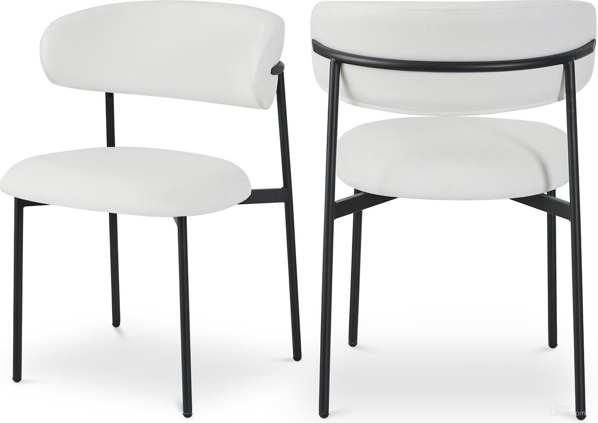 The appearance of Lupita Vegan Leather Dining Chair Set of 2 In White and Matte Black designed by Meridian in the modern / contemporary interior design. This white piece of furniture was selected by 1StopBedrooms from Lupita Collection to add a touch of cosiness and style into your home. Sku: 760White-C. Material: Iron. Chair Type: Side Chair.