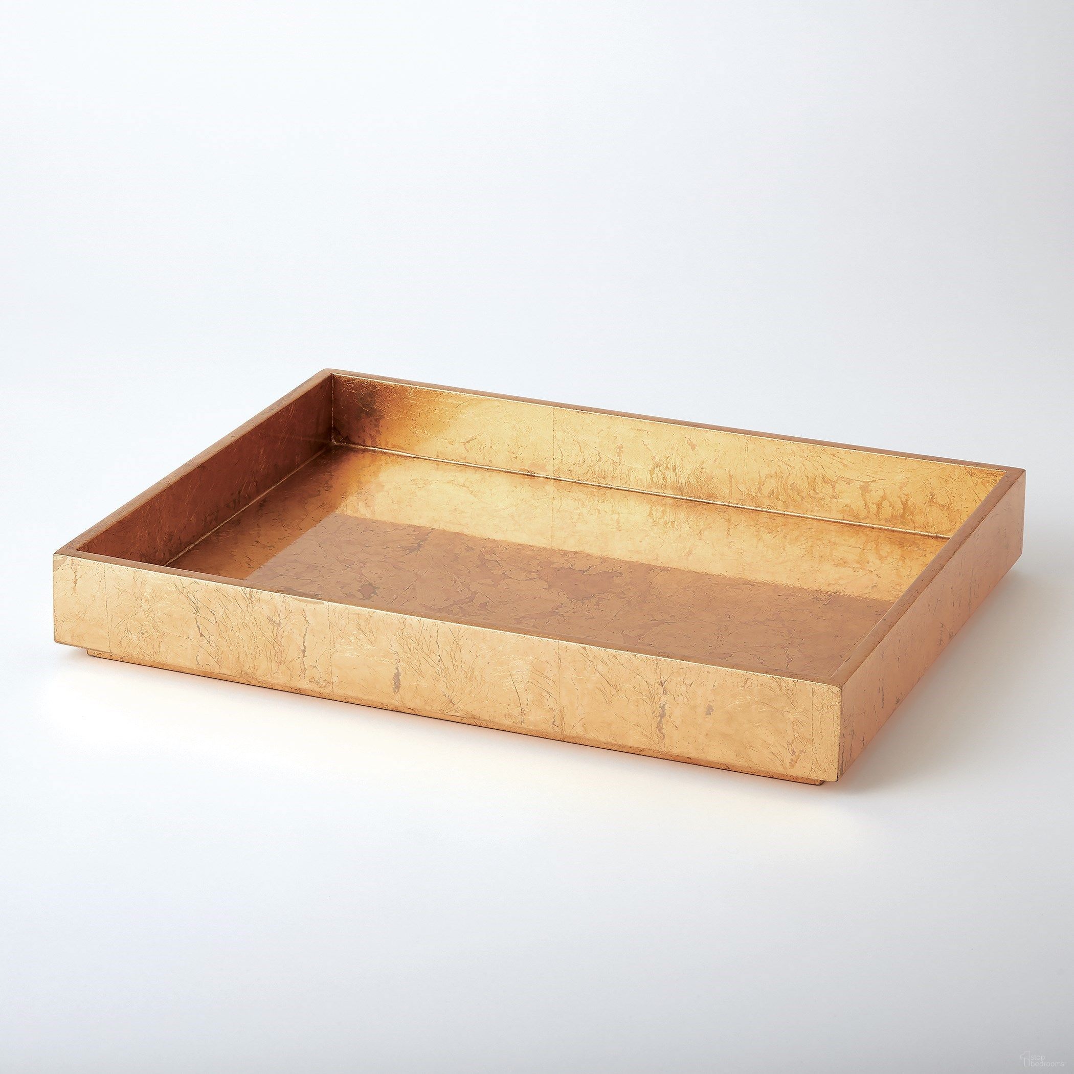 The appearance of Luxe Gold Leaf Rectangle Small Tray designed by Global Views in the modern / contemporary interior design. This gold piece of furniture was selected by 1StopBedrooms from Luxe Collection to add a touch of cosiness and style into your home. Sku: 720045. Material: MDF.