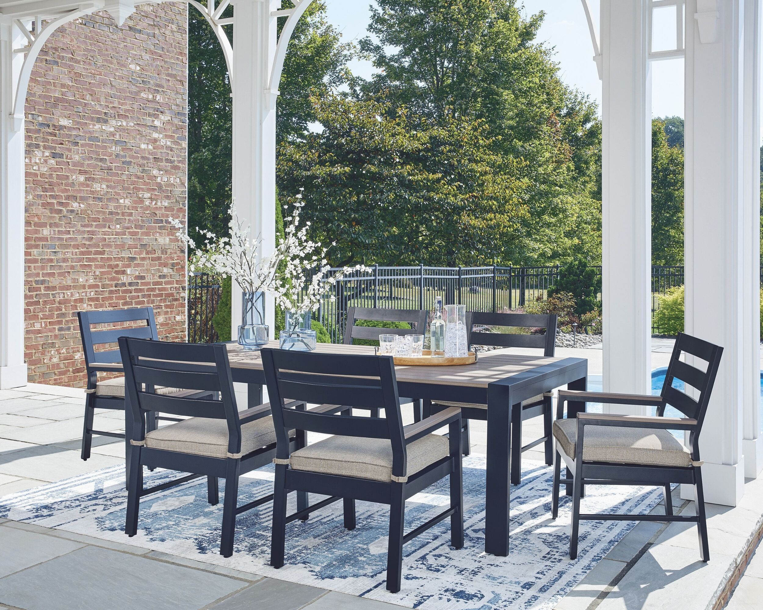 The appearance of Mabry Shores Outdoor Dining Room Set In Blue designed by Signature Design by Ashley in the modern / contemporary interior design. This blue piece of furniture was selected by 1StopBedrooms from Mabry Shores Collection to add a touch of cosiness and style into your home. Sku: P587-625;P587-601A. Table Top Shape: Rectangular. Material: Stainless Steel.