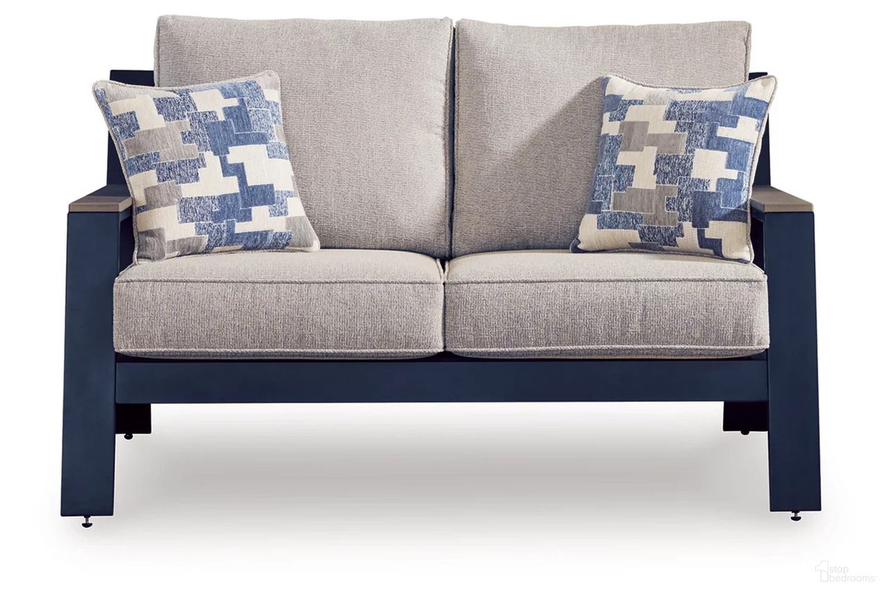 The appearance of Mabry Shores Outdoor Loveseat with Cushion In Blue designed by Signature Design by Ashley in the modern / contemporary interior design. This blue piece of furniture was selected by 1StopBedrooms from Mabry Shores Collection to add a touch of cosiness and style into your home. Sku: P587-835. Material: Fabric.
