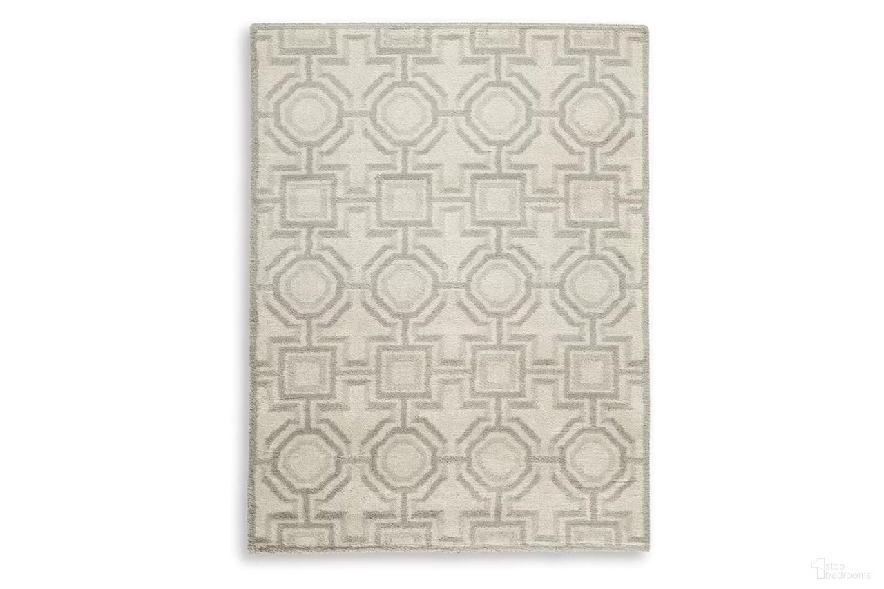 The appearance of Maconville Medium Rug In Gray and Ivory designed by Signature Design by Ashley in the modern / contemporary interior design. This gray and ivory piece of furniture was selected by 1StopBedrooms from Maconville Collection to add a touch of cosiness and style into your home. Sku: R407322. Material: Fabric.