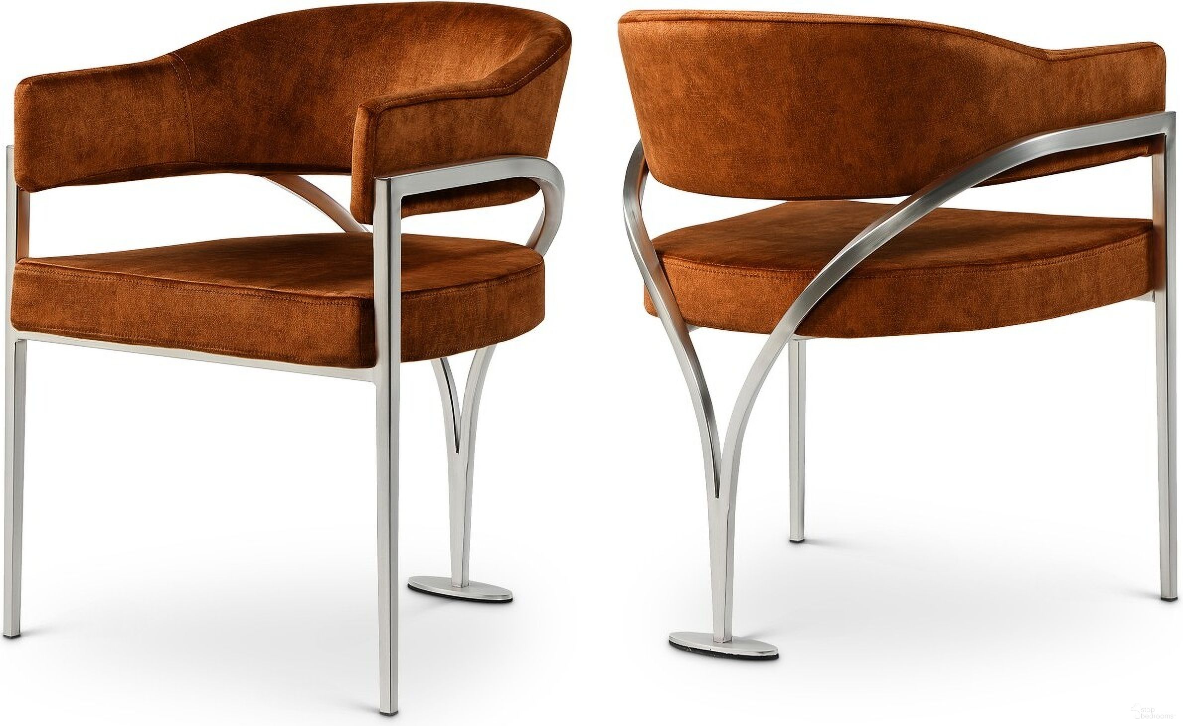 The appearance of Madelyn Velvet Dining Chair Set of 2 In Cognac/Silver designed by Meridian in the modern / contemporary interior design. This cognac piece of furniture  was selected by 1StopBedrooms from Madelyn Collection to add a touch of cosiness and style into your home. Sku: 554Cognac-C. Material: Velvet. Chair Type: Arm Chair.
