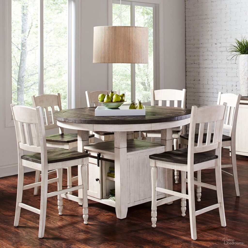 The appearance of Madison County 7 Piece Counter Height Round Dining Set In Vintage White designed by Jofran in the country / farmhouse interior design. This vintage white piece of furniture was selected by 1StopBedrooms from Madison County Collection to add a touch of cosiness and style into your home. Sku: 1706-54B;1706-54T;1706-BS420KD;1706-BS420KD;1706-BS420KD. Table Base Style: Storage. Table Top Shape: Round. Material: Pine.