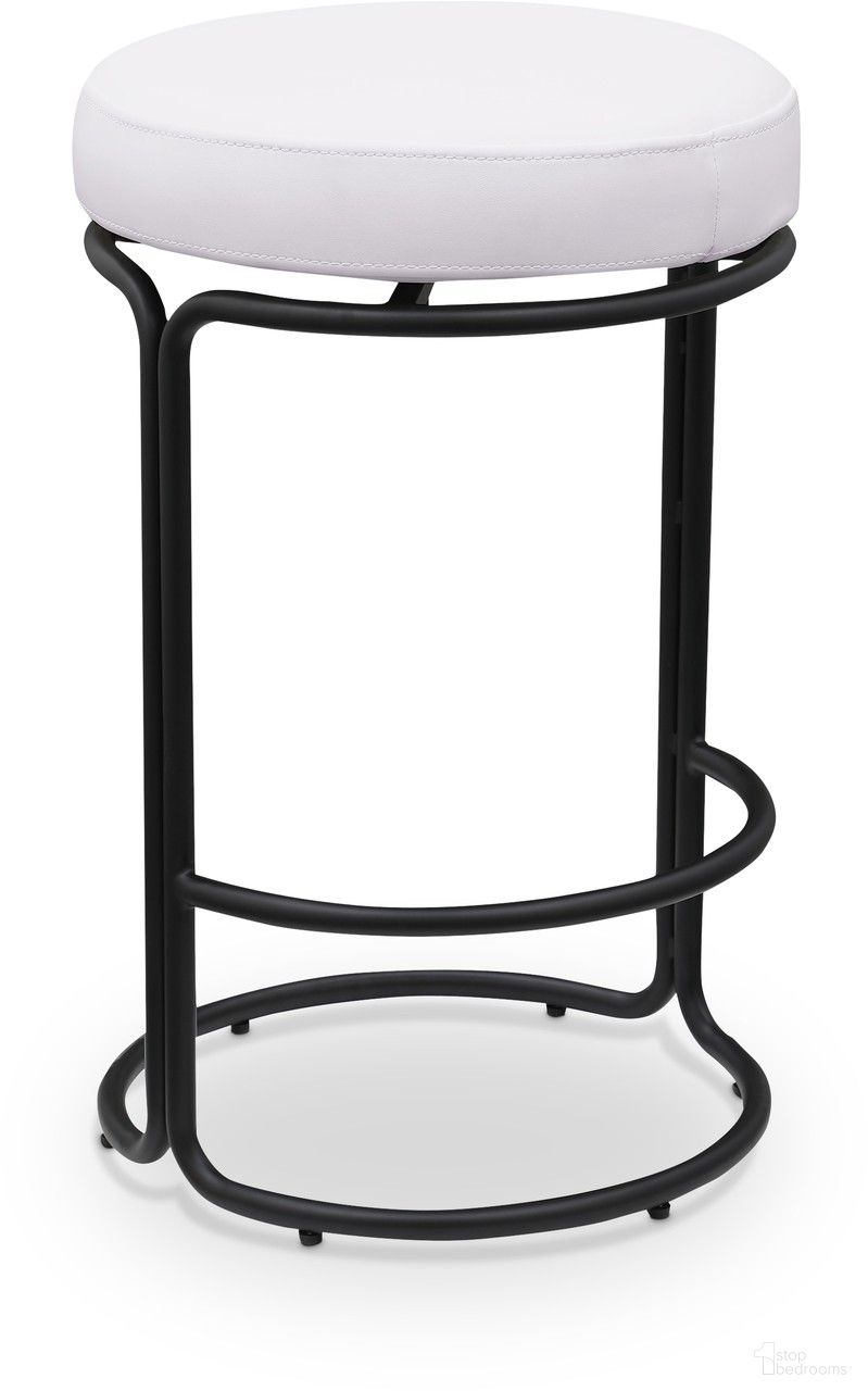 The appearance of Madison Vegan Leather Counter Stool Set of 2 In Cream designed by Meridian in the modern / contemporary interior design. This cream piece of furniture  was selected by 1StopBedrooms from Madison Collection to add a touch of cosiness and style into your home. Sku: 984Cream-C. Material: Iron.