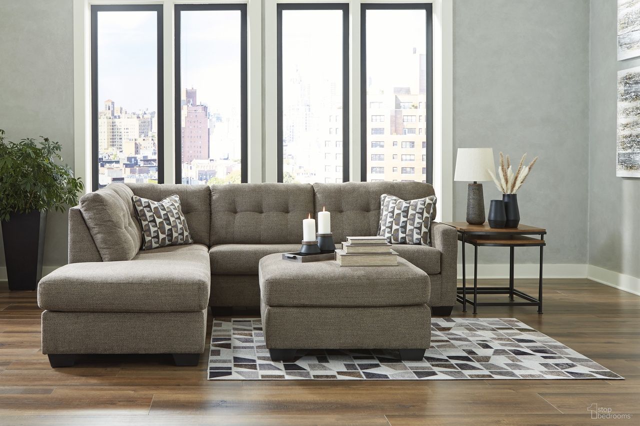 The appearance of Mahoney 2-Piece Sleeper Sectional and Ottoman In Chocolate designed by Signature Design by Ashley in the modern / contemporary interior design. This chocolate piece of furniture was selected by 1StopBedrooms from Mahoney Collection to add a touch of cosiness and style into your home. Sku: 3100510;3100517;3100508. Material: Fabric.