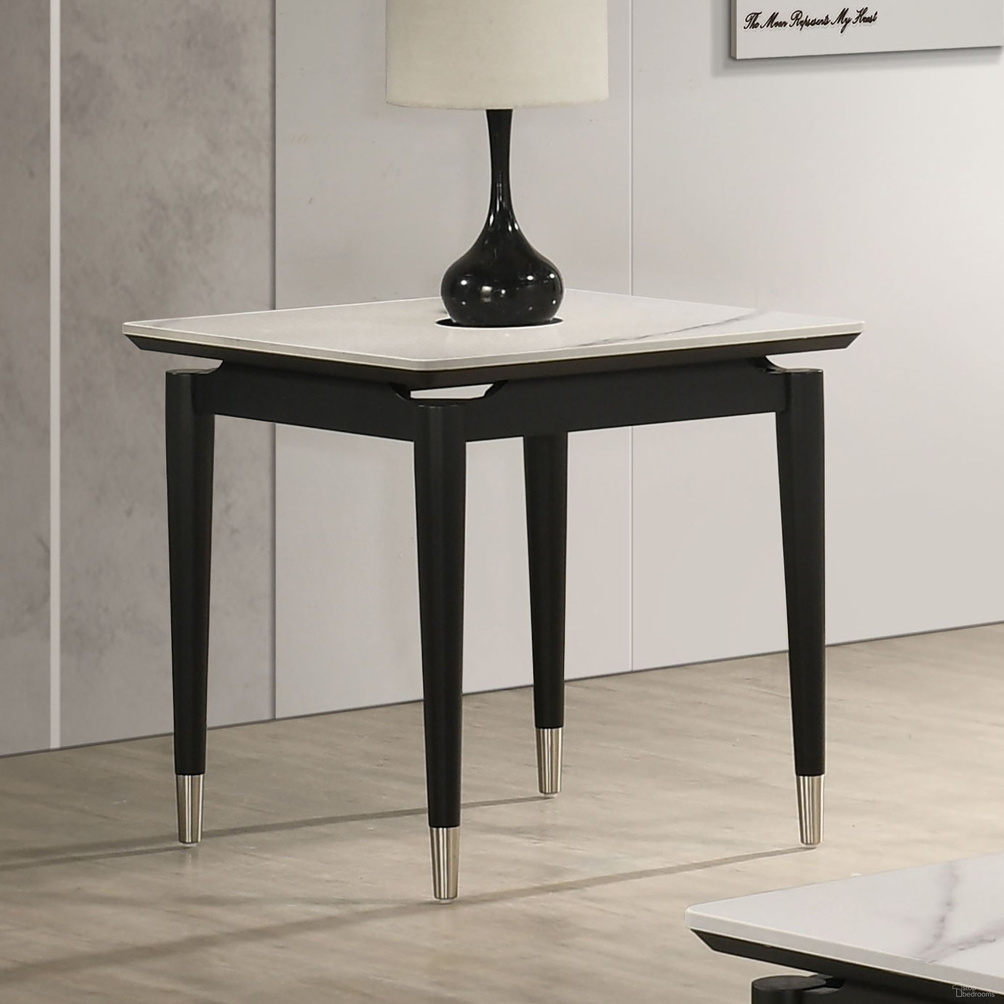 The appearance of Maidstone End Table In Black and White designed by Furniture of America in the modern / contemporary interior design. This black/white piece of furniture was selected by 1StopBedrooms from Maidstone Collection to add a touch of cosiness and style into your home. Sku: FM42001BK-E. Material: Stone.
