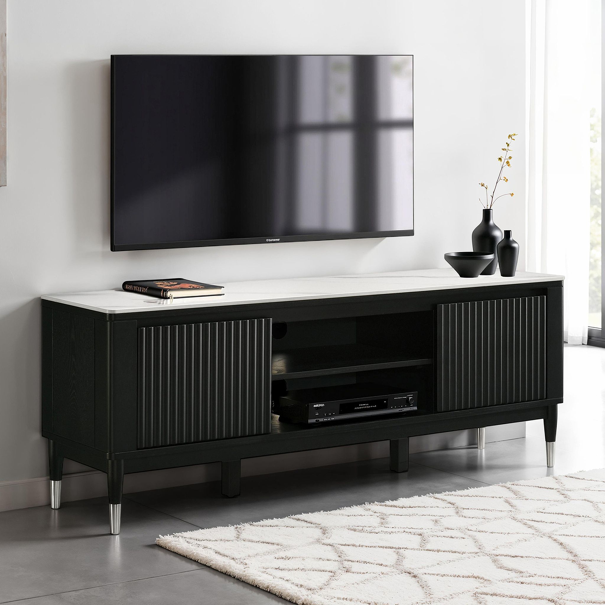 The appearance of Maidstone Tv Console In Black and White designed by Furniture of America in the modern / contemporary interior design. This black/white piece of furniture was selected by 1StopBedrooms from Maidstone Collection to add a touch of cosiness and style into your home. Sku: FM42001BK-TV. Material: Stone.