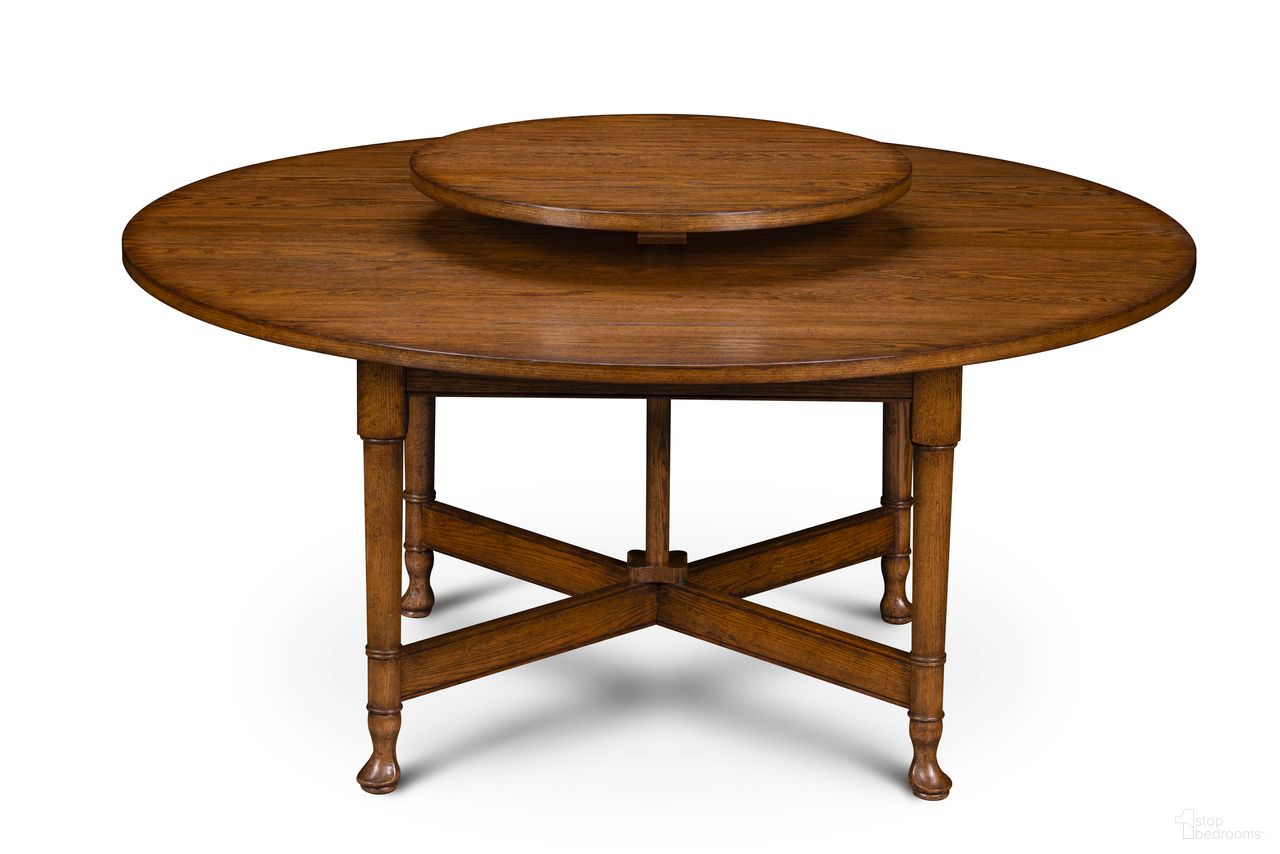 The appearance of Rosemary Dining Table In Brown designed by Maitland-Smith in the transitional interior design. This brown piece of furniture  was selected by 1StopBedrooms from Maitland Smith Collection to add a touch of cosiness and style into your home. Sku: 8641-35. Table Base Style: Trestle. Table Top Shape: Round. Size: 64". Material: Solid Wood.