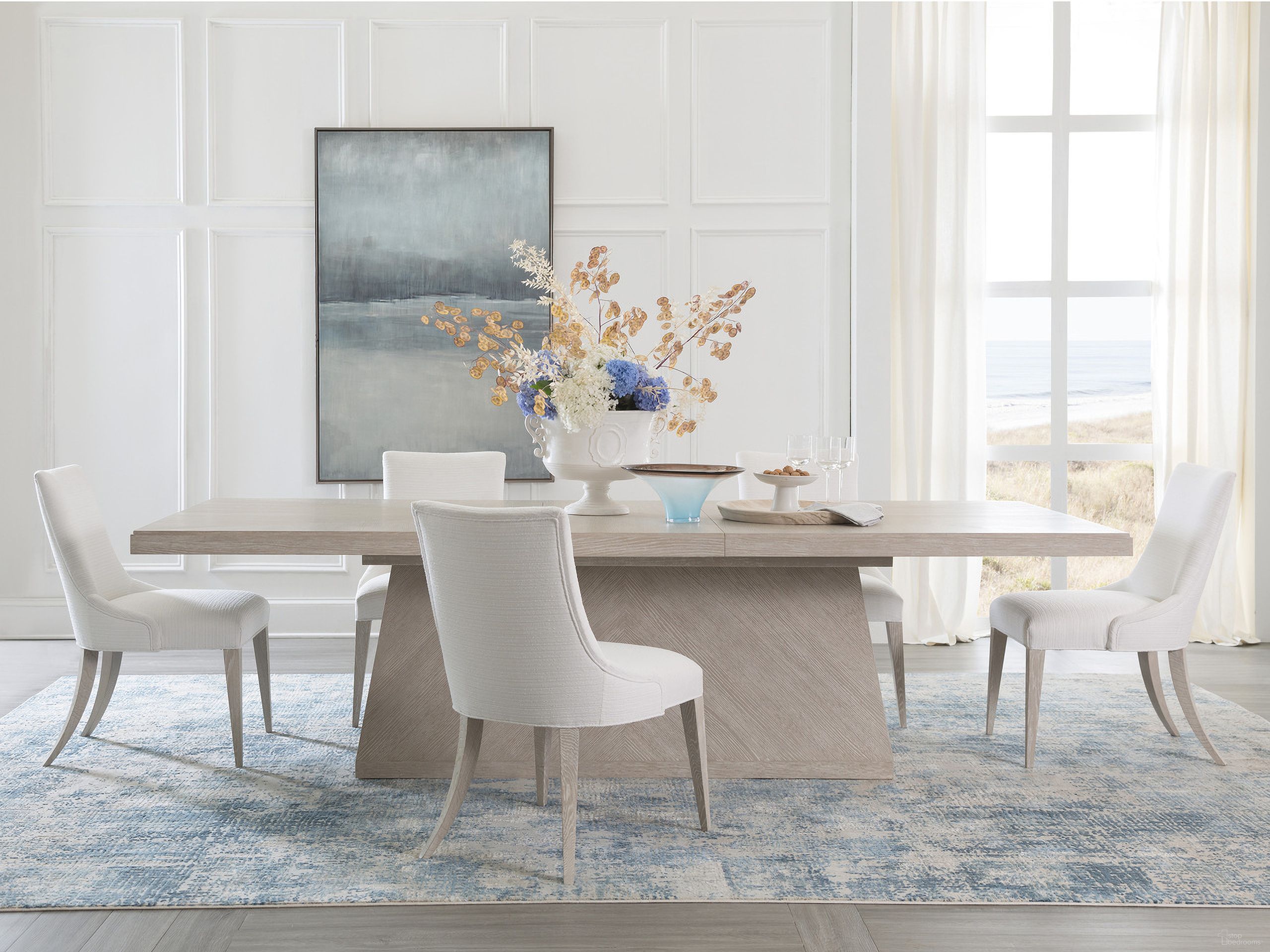 The appearance of Mar Monte Rectangular Dining Set In Taupe designed by Artistica Home in the coastal interior design. This taupe piece of furniture was selected by 1StopBedrooms from Mar Monte Collection to add a touch of cosiness and style into your home. Sku: 2300-877C;2300-880-01. Table Base Style: Pedestal. Material: Wood. Table Top Shape: Rectangular. Size: 48" x 88".