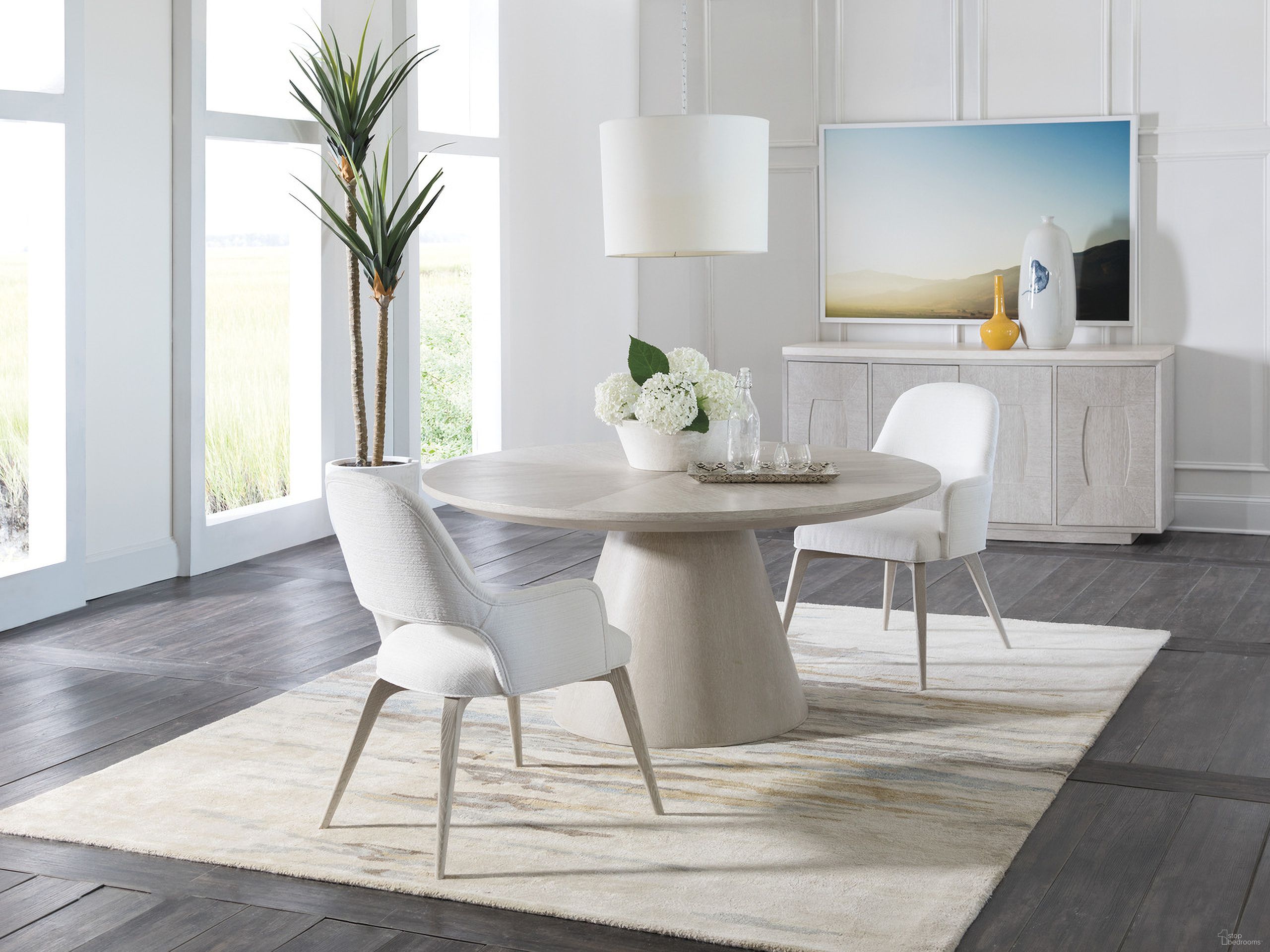 The appearance of Mar Monte Round Dining Set In Taupe designed by Artistica Home in the coastal interior design. This taupe piece of furniture was selected by 1StopBedrooms from Mar Monte Collection to add a touch of cosiness and style into your home. Sku: 2300-870C;2300-881-01. Table Base Style: Pedestal. Table Top Shape: Round. Material: Wood. Size: 60".