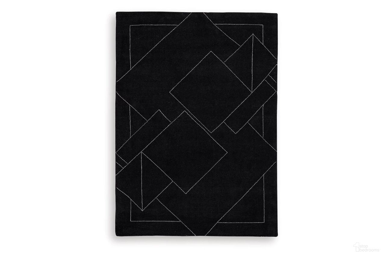 The appearance of Marav 5' x 7' Area Rug In Black and White designed by Signature Design by Ashley in the modern / contemporary interior design. This black/white piece of furniture was selected by 1StopBedrooms from Marav Collection to add a touch of cosiness and style into your home. Sku: R407532.