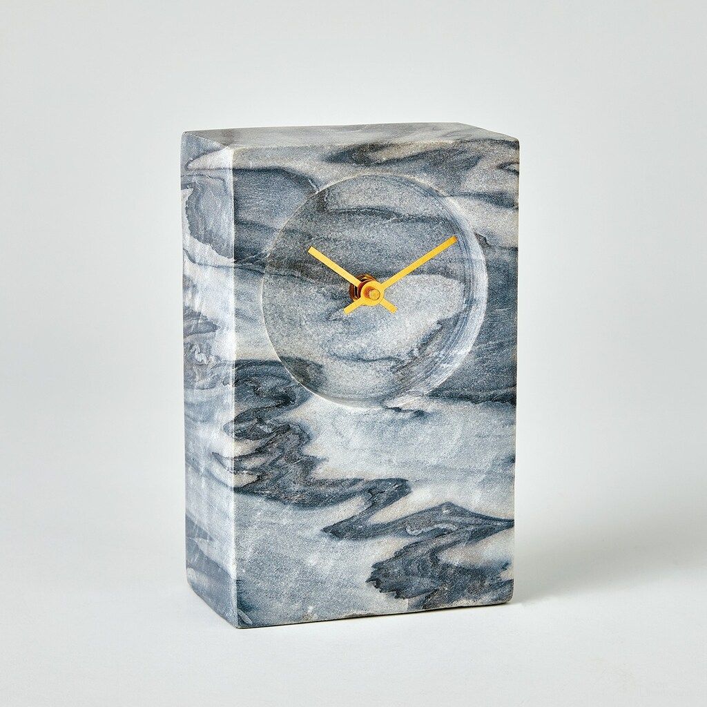 The appearance of Marble Tower Clock In Black and Grey designed by Global Views in the modern / contemporary interior design. This black/grey piece of furniture  was selected by 1StopBedrooms from Marble Collection to add a touch of cosiness and style into your home. Sku: 791532. Material: Steel.