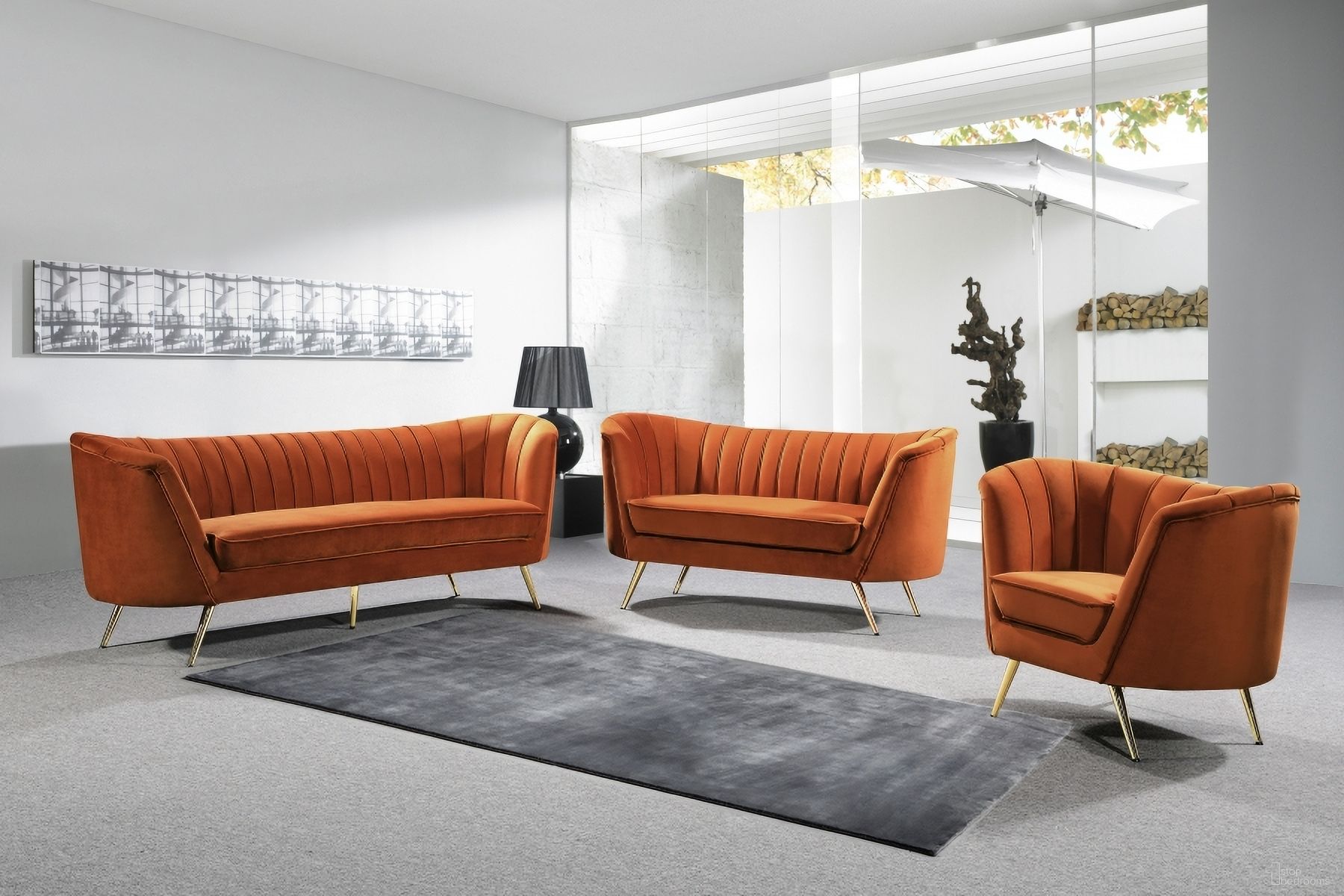 The appearance of Margo Living Room Set In Cognac designed by Meridian in the modern / contemporary interior design. This cognac piece of furniture  was selected by 1StopBedrooms from Margo Collection to add a touch of cosiness and style into your home. Sku: 622Cognac-S;622Cognac-L. Material: Velvet.