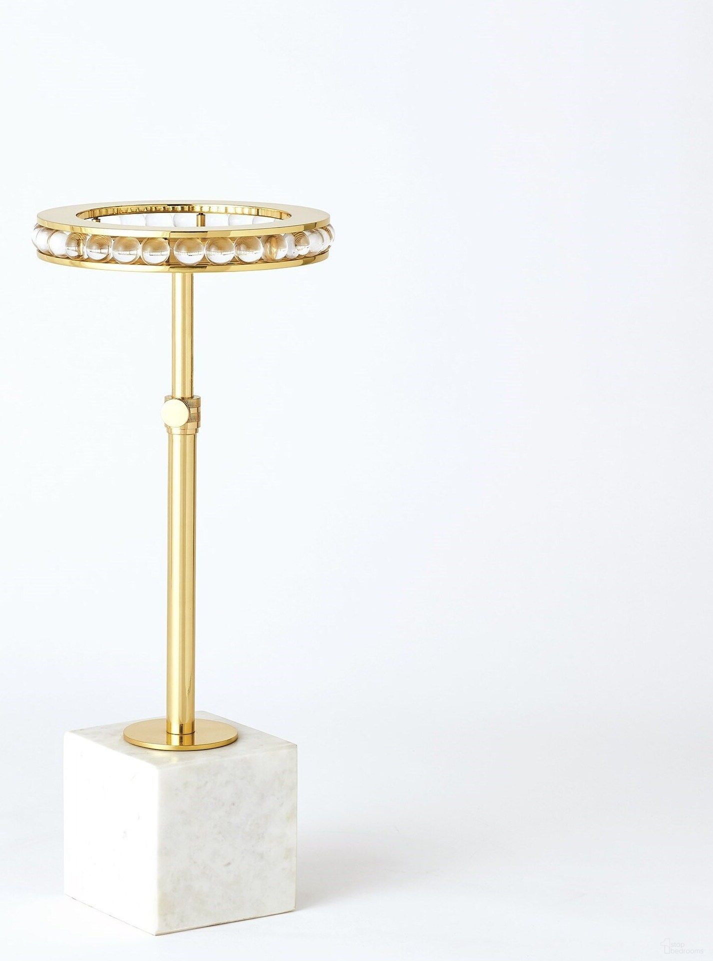 The appearance of Margot Side Table In Brass designed by Global Views in the modern / contemporary interior design. This white piece of furniture  was selected by 1StopBedrooms from Margot Collection to add a touch of cosiness and style into your home. Sku: JB990132. Material: Marble.