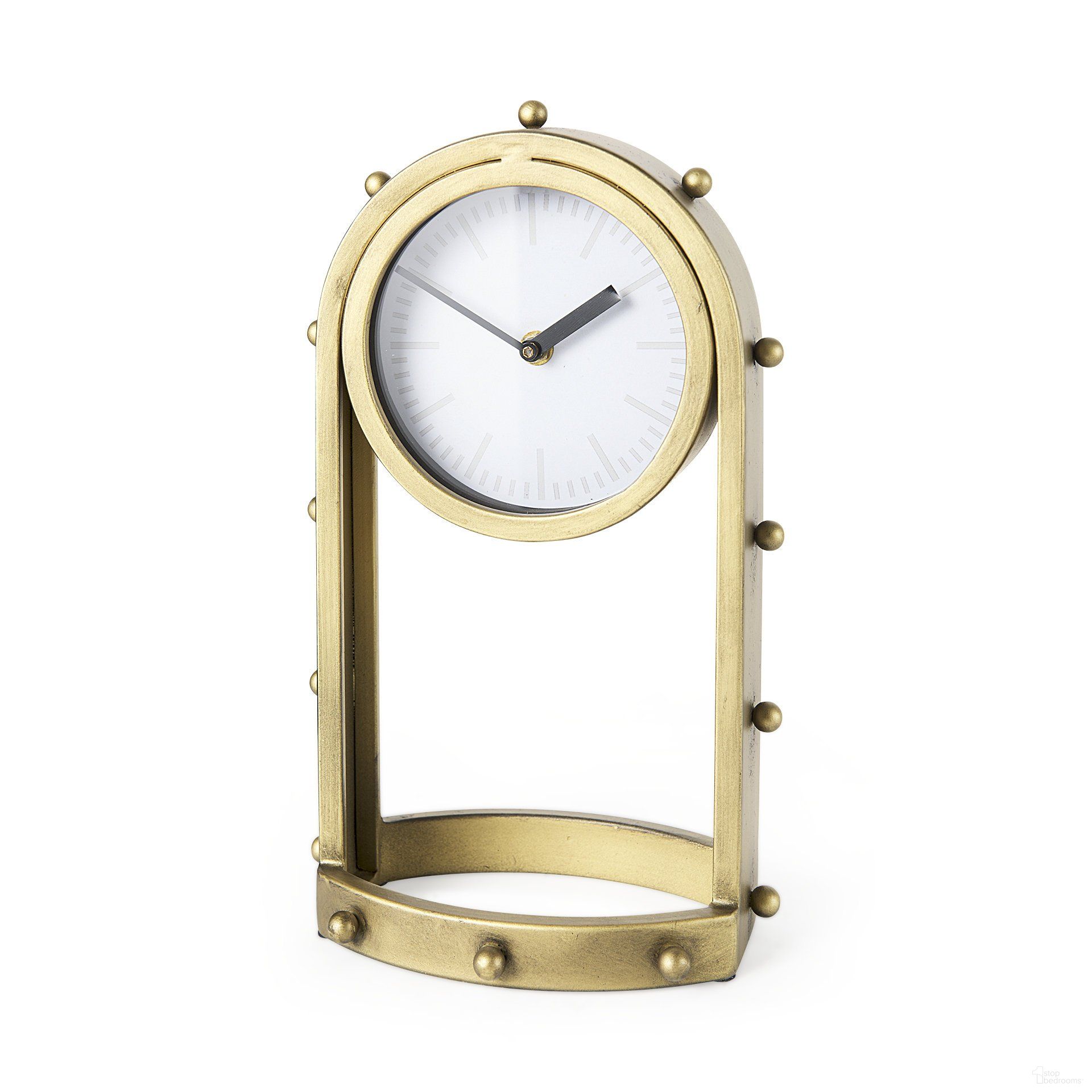 The appearance of Marian Studded Table Clock In Gold designed by Mercana in the modern / contemporary interior design. This gold piece of furniture was selected by 1StopBedrooms from Marian Collection to add a touch of cosiness and style into your home. Sku: 69484. Material: Metal.