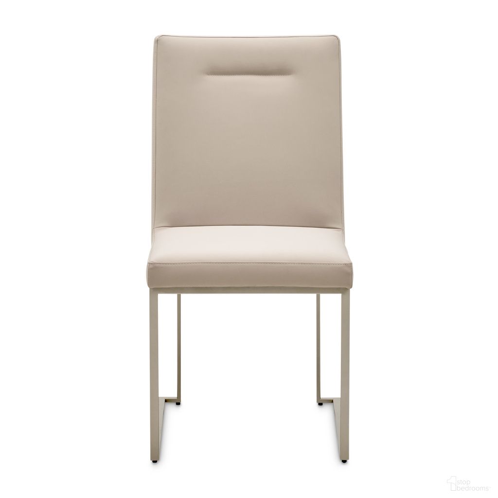 The appearance of Marin Dining Side Chair Set of 2 In Greige designed by Michael Amini in the modern / contemporary interior design. This greige piece of furniture was selected by 1StopBedrooms from Marin Collection to add a touch of cosiness and style into your home. Sku: NKI-MRIN003-139. Material: Solid Wood. Chair Type: Side Chair.
