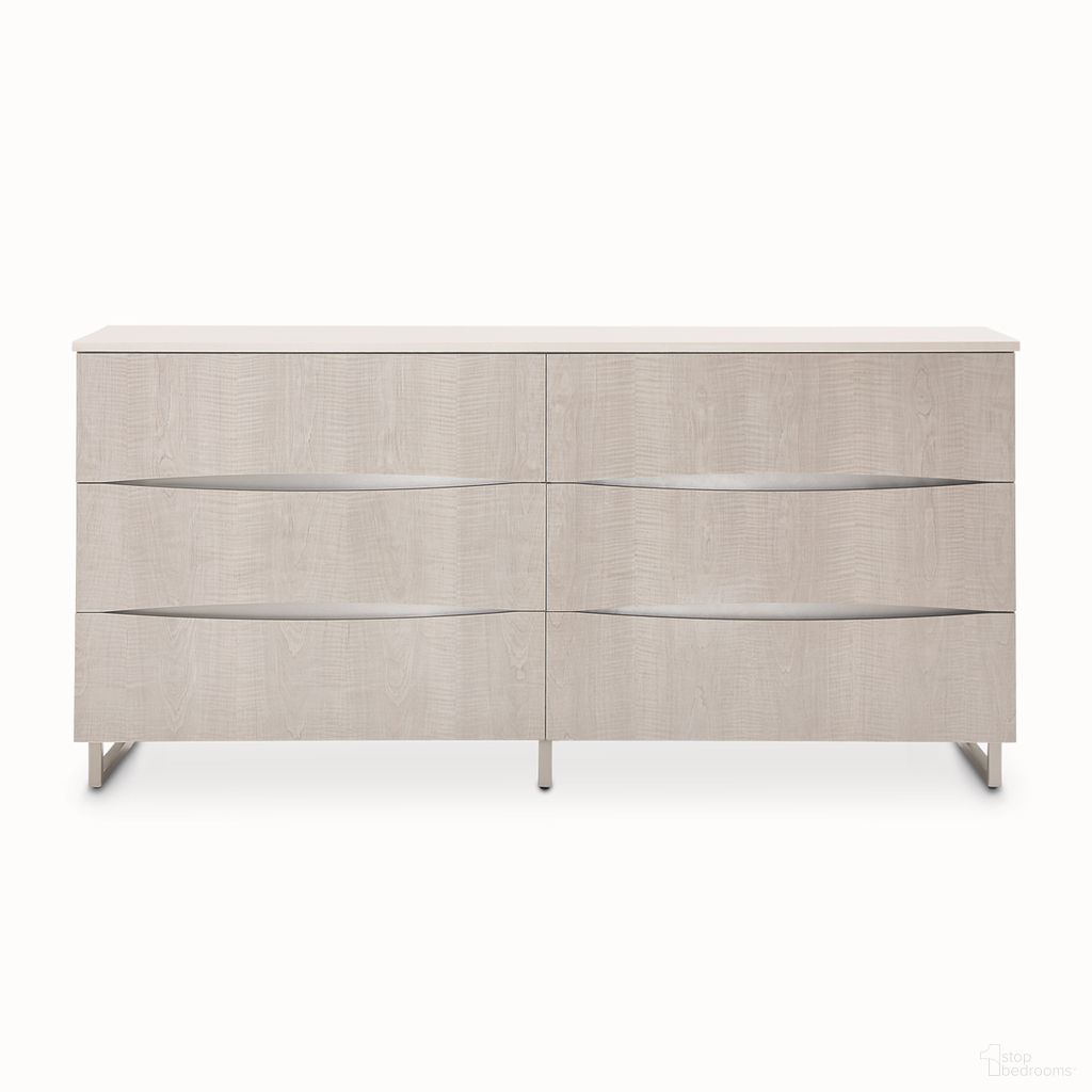 The appearance of Marin Dresser In Greige designed by Michael Amini in the modern / contemporary interior design. This greige piece of furniture was selected by 1StopBedrooms from Marin Collection to add a touch of cosiness and style into your home. Sku: NKI-MRIN050SA-139. Material: Wood.