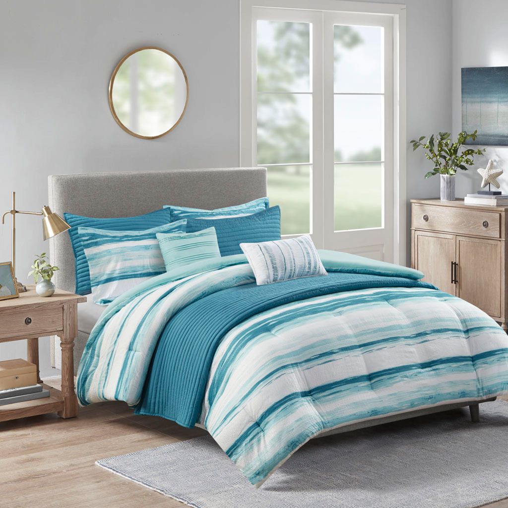 The appearance of Marina 8 Piece Printed Seersucker King/Cal King Comforter and Quilt Set In Aqua designed by Olliix in the coastal interior design. This aqua piece of furniture was selected by 1StopBedrooms from Marina Collection to add a touch of cosiness and style into your home. Sku: MP10-7947. Material: Polyester. Bed Size: King.