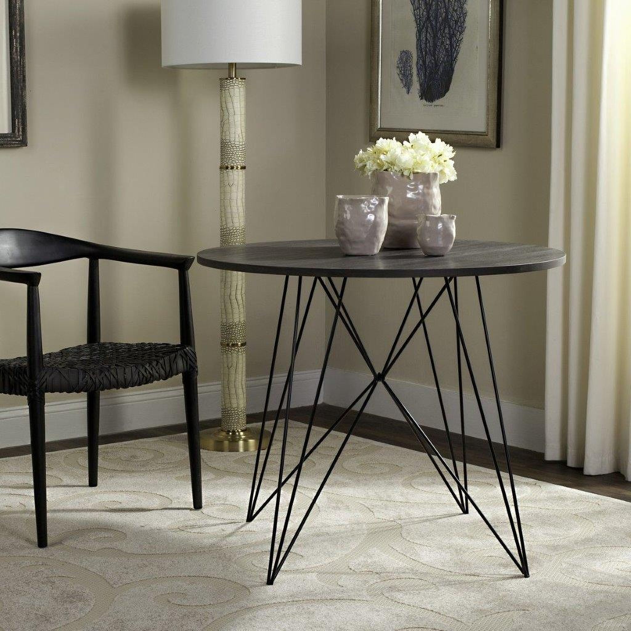 The appearance of Marino Dark Gray Round Dining Room Set designed by Safavieh in the transitional interior design. This brown and gray piece of furniture was selected by 1StopBedrooms from to add a touch of cosiness and style into your home. Sku: FOX4260A;FOX1003A. Table Base Style: Pedestal. Table Top Shape: Round. Material: Iron. Size: 35".