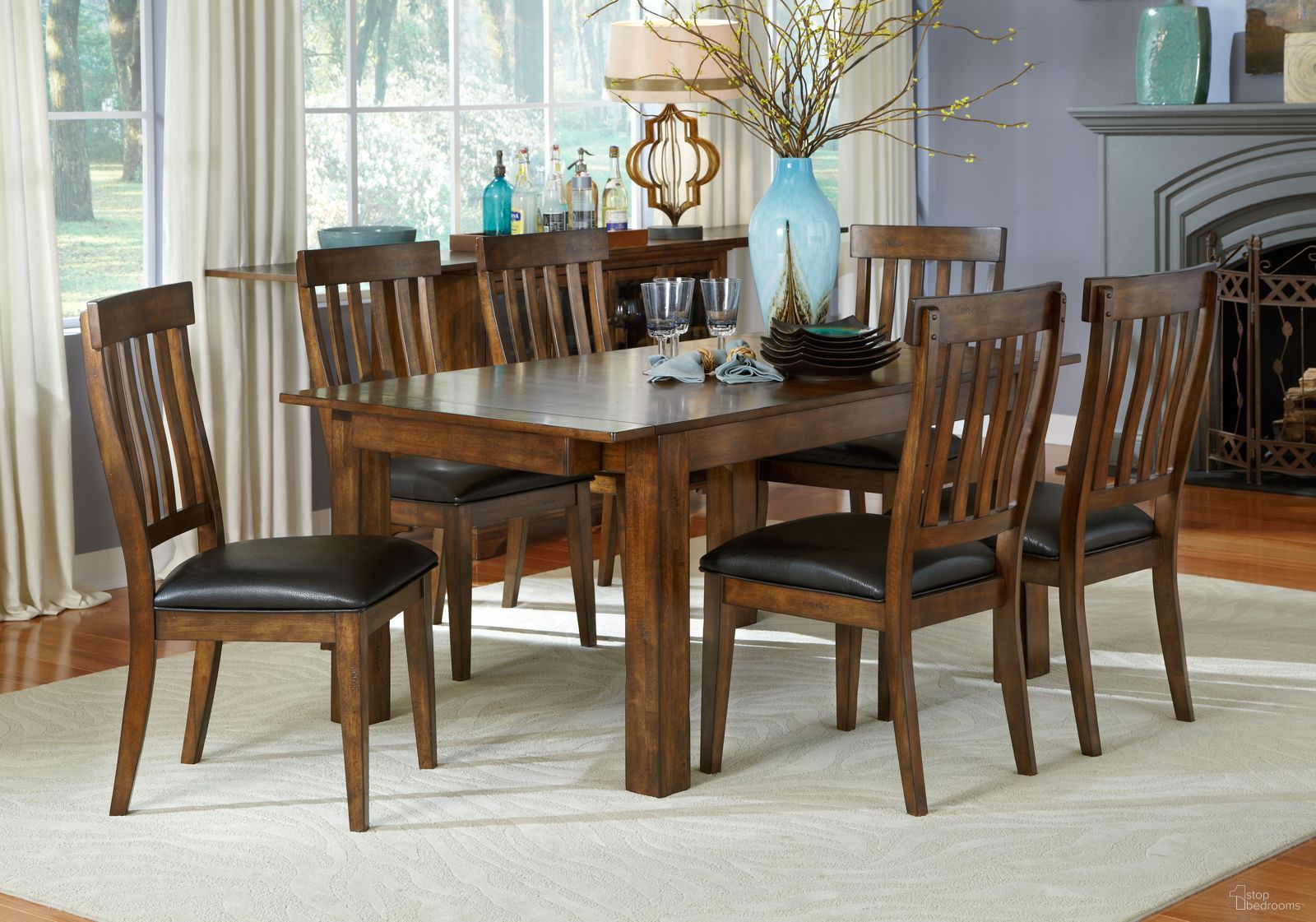 The appearance of Mariposa Dining Set In Rustic Whiskey designed by A-America in the transitional interior design. This whiskey piece of furniture was selected by 1StopBedrooms from Mariposa Collection to add a touch of cosiness and style into your home. Sku: MRPRW601B;MRPRW601T;MRPRW2652. Table Base Style: Legs. Table Top Shape: Square. Material: Rubberwood. Size: 54" x 36".