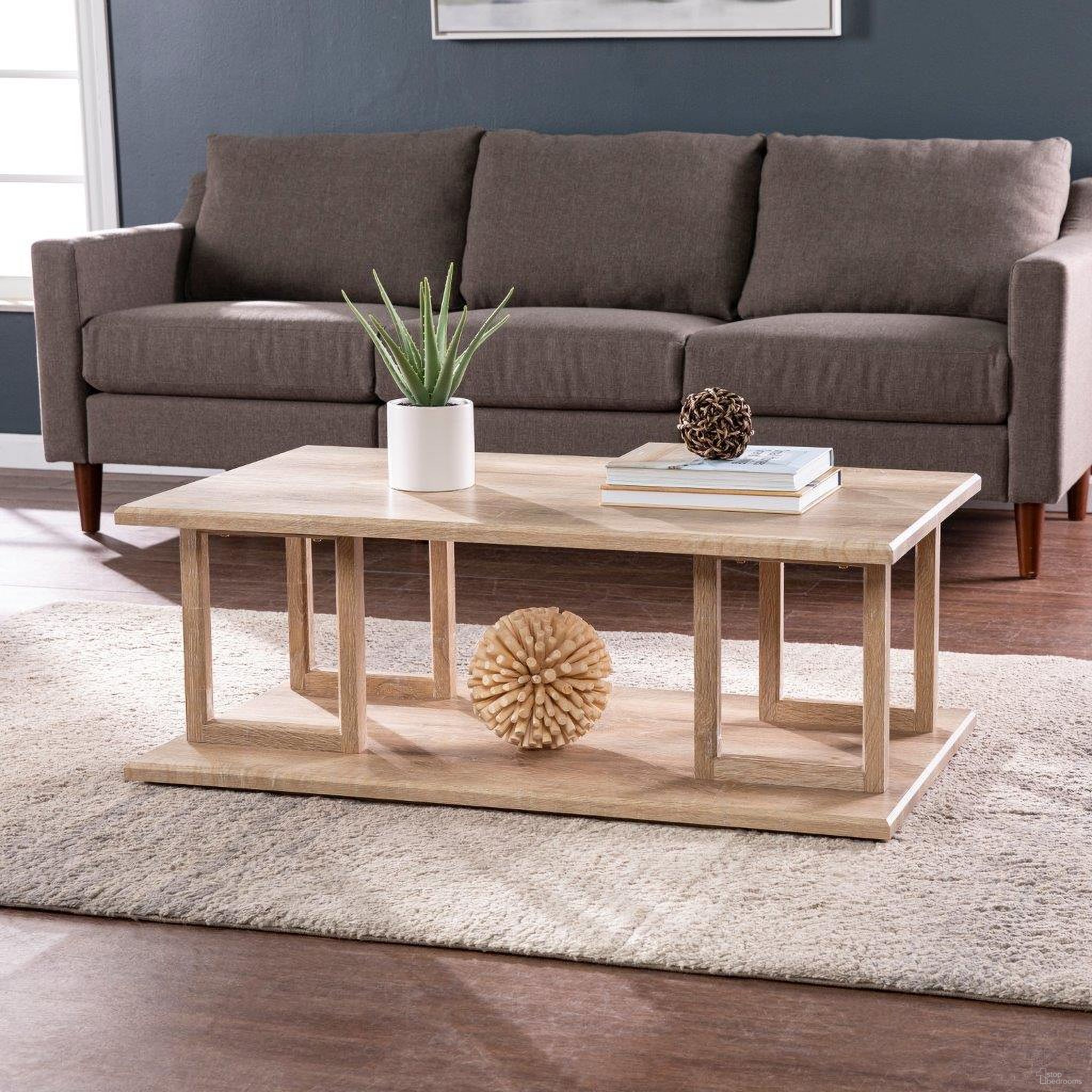 The appearance of Markworth Geometric Cocktail Table designed by SEI Furniture in the transitional interior design. This natural piece of furniture was selected by 1StopBedrooms from Markworth Collection to add a touch of cosiness and style into your home. Sku: CK1101700. Material: Wood.