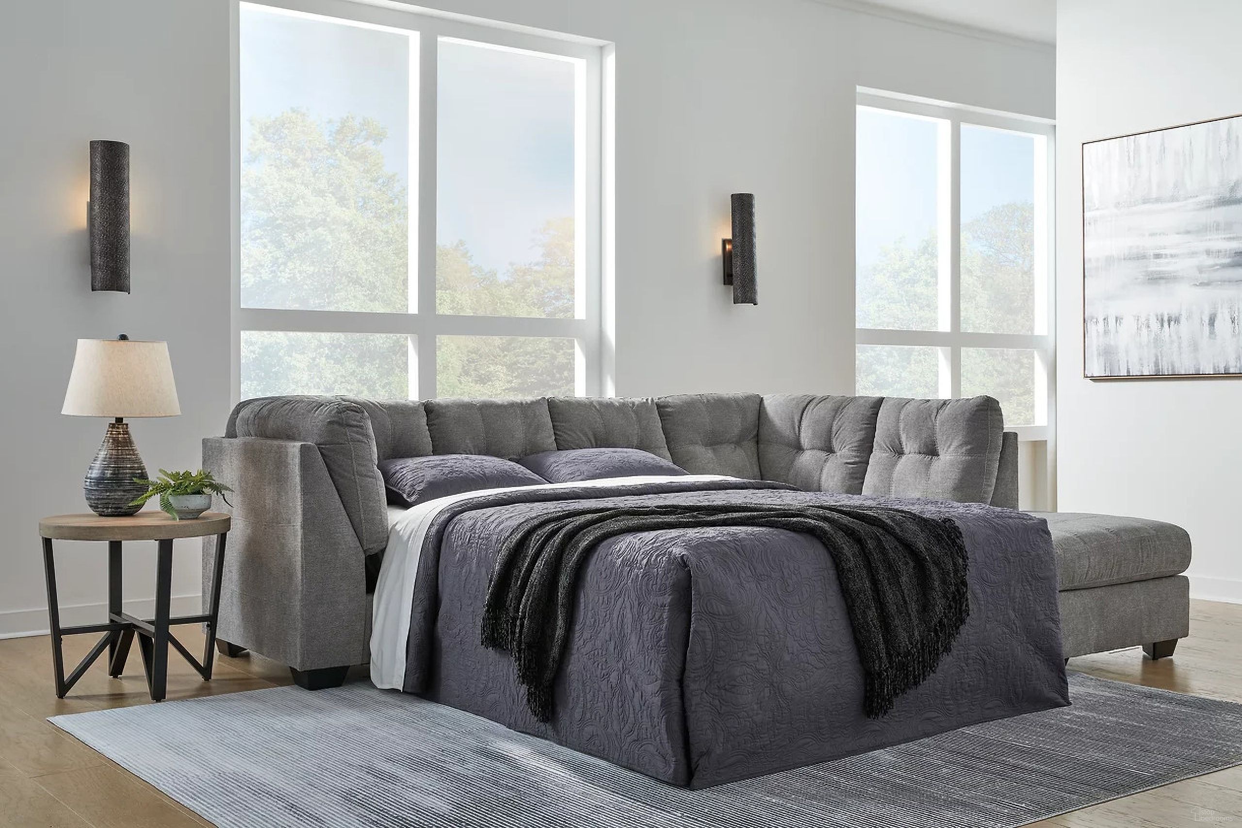 The appearance of Marleton 2-Piece RAF Sleeper Sectional With Chaise In Gray designed by Signature Design by Ashley in the modern / contemporary interior design. This gray piece of furniture was selected by 1StopBedrooms from Marleton Collection to add a touch of cosiness and style into your home. Sku: 5530517;5530510. Material: Polyester. Layout: L-Shape. Orientation: RAF.