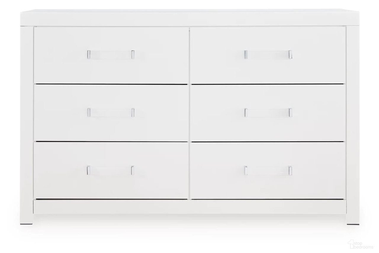 The appearance of Marzoni Six Drawer Dresser In White designed by Signature Design by Ashley in the modern / contemporary interior design. This white piece of furniture  was selected by 1StopBedrooms from Marzoni Collection to add a touch of cosiness and style into your home. Sku: NCB1119-31.