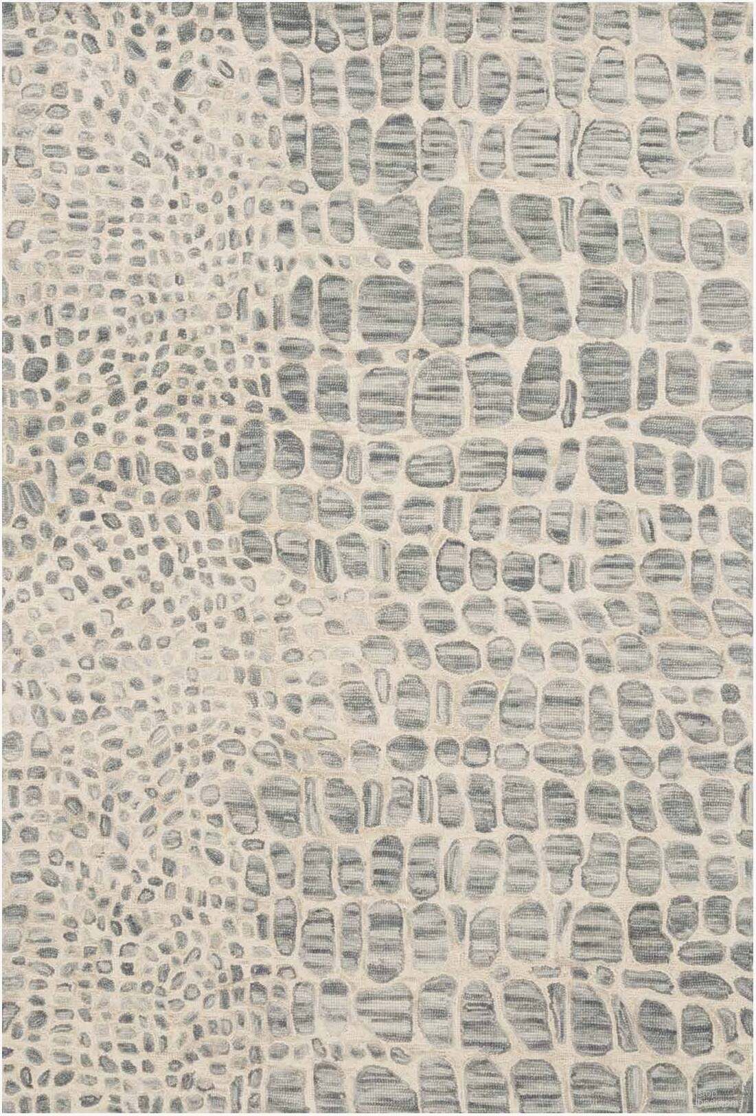 The appearance of Masai Silver Grey/Ivory 5' x 7'6" Rug designed by Loloi Rugs in the modern / contemporary interior design. This silver grey and ivory piece of furniture was selected by 1StopBedrooms from Masai Collection to add a touch of cosiness and style into your home. Sku: MASAMAS-03SYIV5076. Material: Wool.