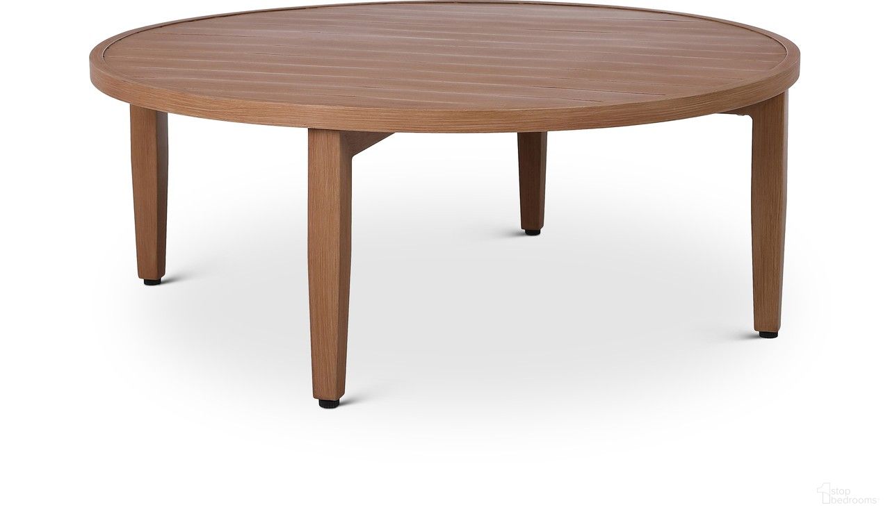 The appearance of Maui Outdoor Patio Coffee Table In Natural designed by Meridian in the modern / contemporary interior design. This natural piece of furniture  was selected by 1StopBedrooms from Maui Collection to add a touch of cosiness and style into your home. Sku: 363-C. Table Top Shape: Round. Material: Aluminum.