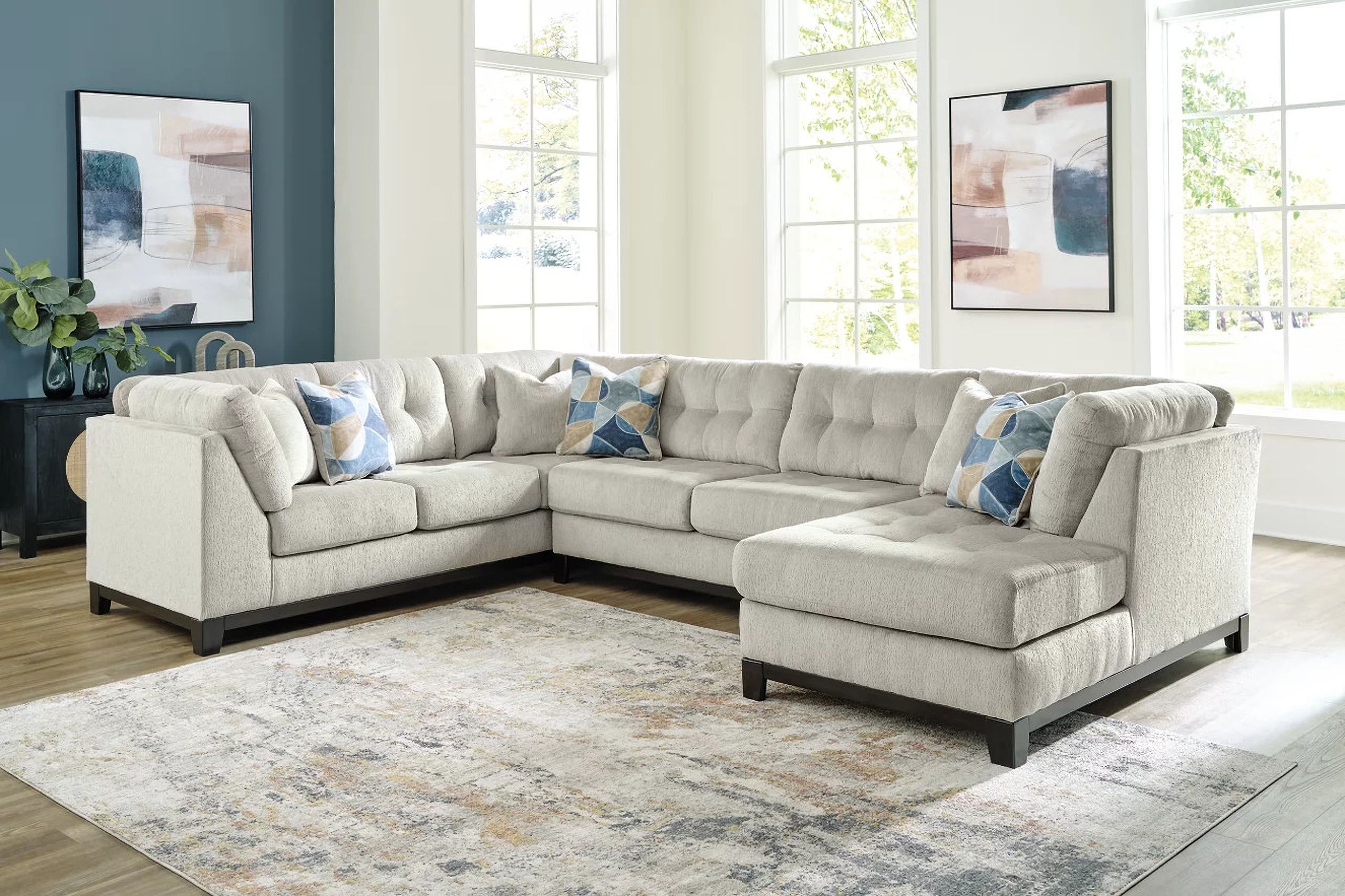 The appearance of Maxon Place 3-Piece Sectional with Chaise In Stone designed by Signature Design by Ashley in the modern / contemporary interior design. This stone piece of furniture was selected by 1StopBedrooms from Maxon Place Collection to add a touch of cosiness and style into your home. Sku: 3300438;3300434;3300417. Material: Fabric. Layout: U-Shape.