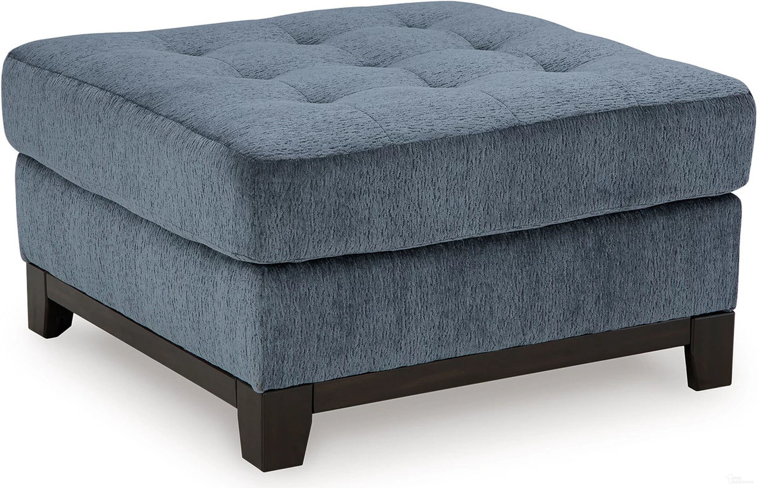 The appearance of Maxon Place Oversized Accent Ottoman In Navy designed by Signature Design by Ashley in the modern / contemporary interior design. This navy piece of furniture was selected by 1StopBedrooms from Maxon Place Collection to add a touch of cosiness and style into your home. Sku: 3300308. Material: Fabric.