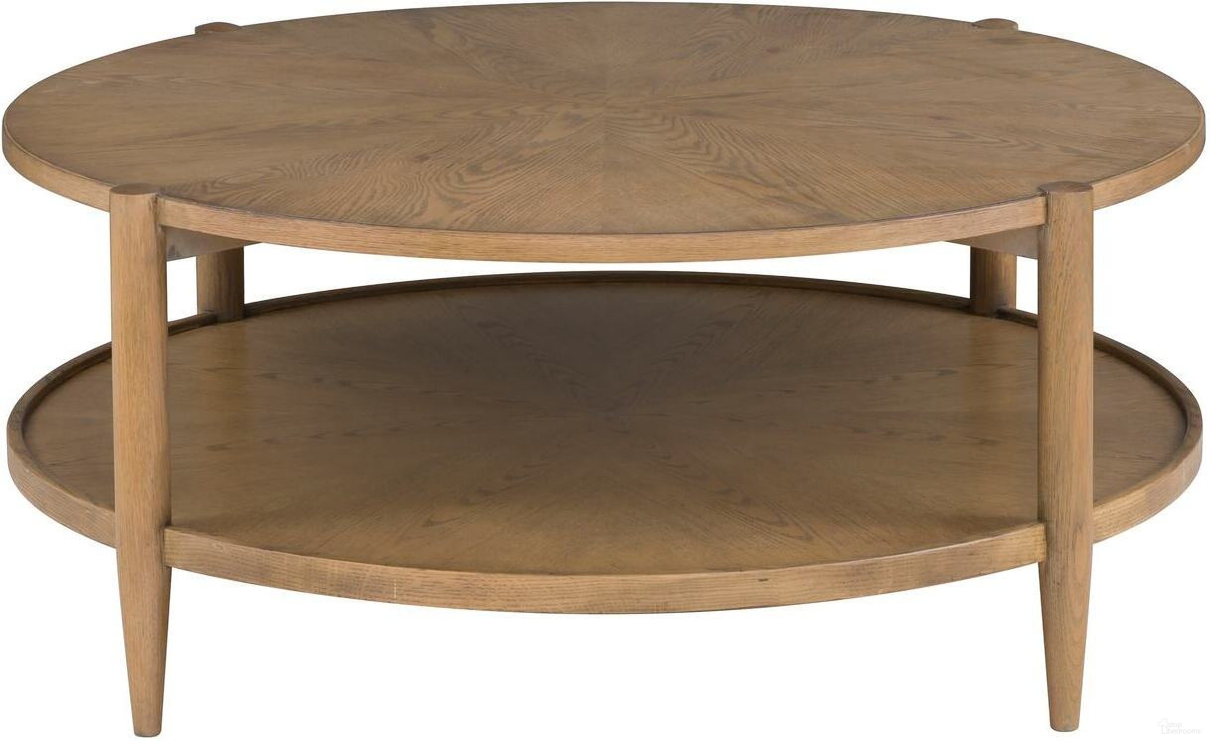 The appearance of Maxwell Round Cocktail Table In Sunlit Oak designed by Fairfield Chair in the modern / contemporary interior design. This sunlit oak piece of furniture was selected by 1StopBedrooms from Maxwell Collection to add a touch of cosiness and style into your home. Sku: 8057-13-S. Material: Solid Oak.