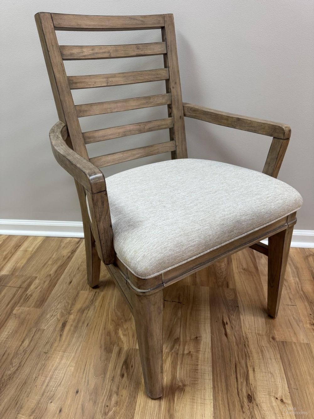 The appearance of Meadowbrook Ladder Arm Chair Set of 2 In Sand designed by American Woodcrafters in the coastal interior design. This sand piece of furniture was selected by 1StopBedrooms from Meadowbrook Collection to add a touch of cosiness and style into your home. Sku: D-2600-680. Chair Type: Arm Chair. Material: Hardwood.