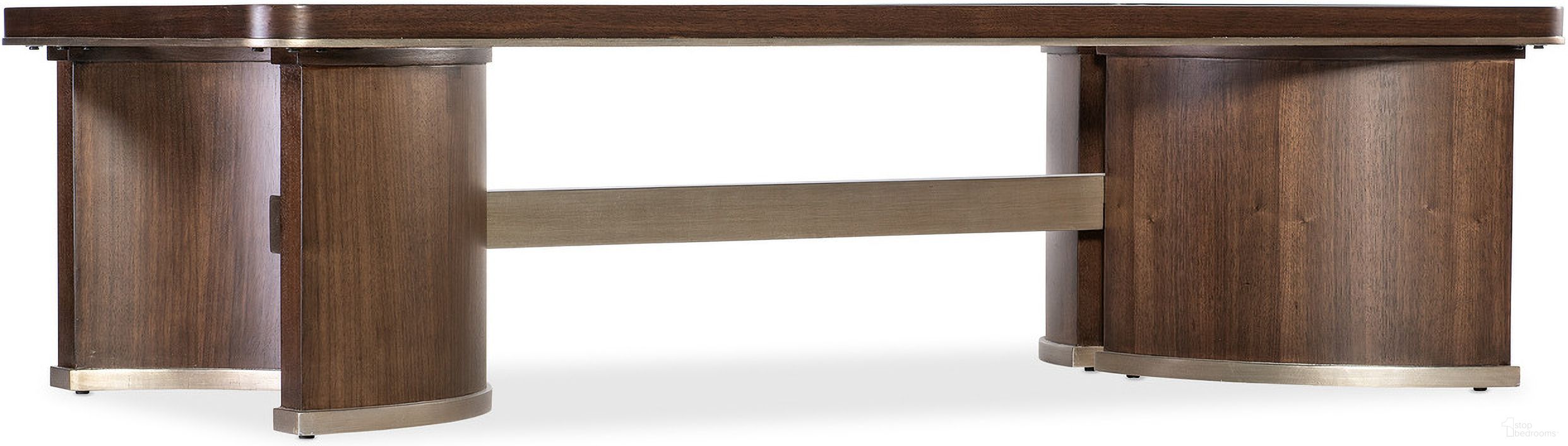 The appearance of Melange Contours Cocktail Table In Dark Wood designed by Hooker in the traditional interior design. This dark wood piece of furniture  was selected by 1StopBedrooms from Melange Collection to add a touch of cosiness and style into your home. Sku: 628-80550-89. Material: Walnut Veneer.